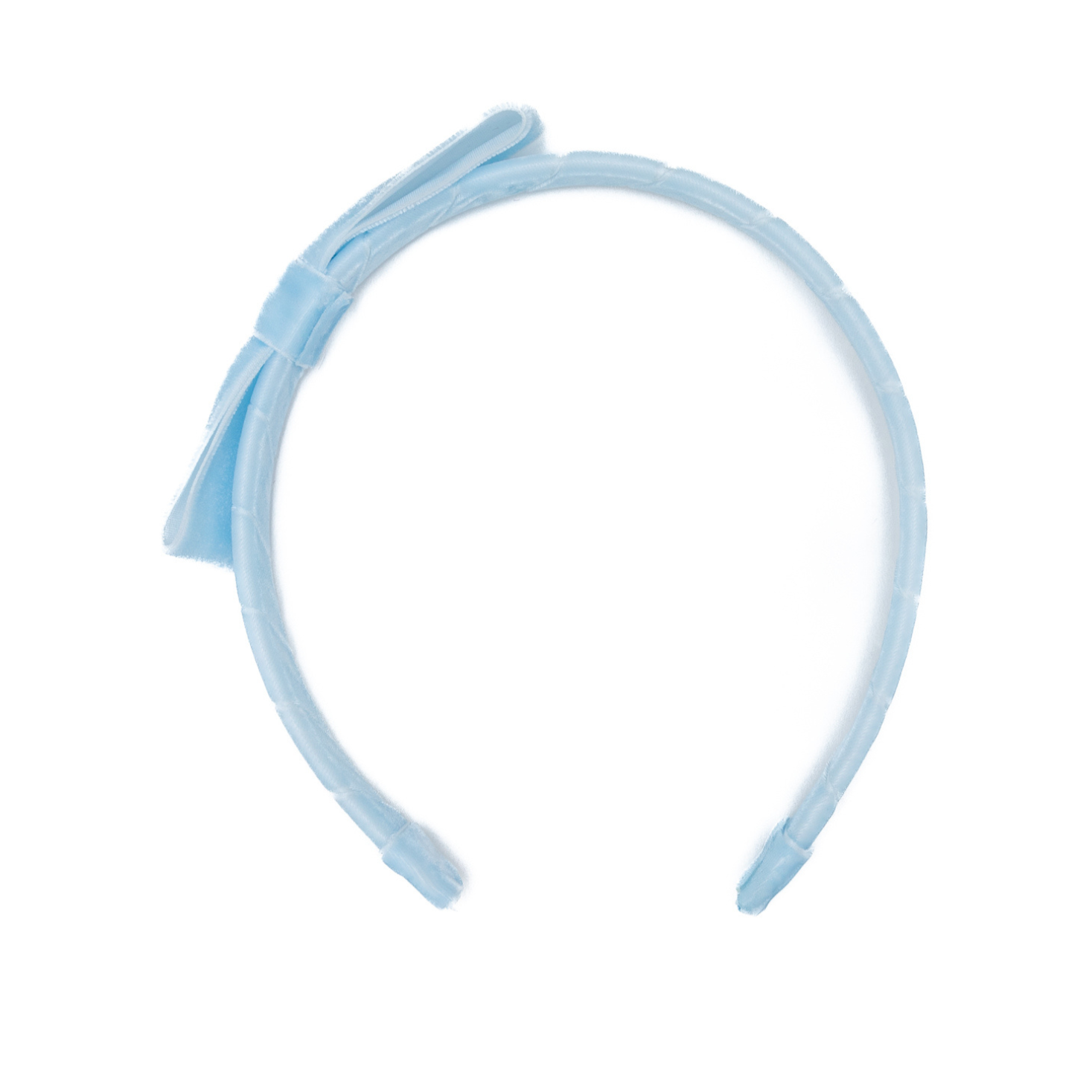 A timeless finishing touch, the Velvet Lottie Headband by Winn & William is a classic accessory designed to elevate any fall ensemble. Hand-wrapped and handcrafted in Dallas, Texas, this velvet headband features a perfectly proportioned bow and a soft, structured shape that’s as comfortable as it is charming.