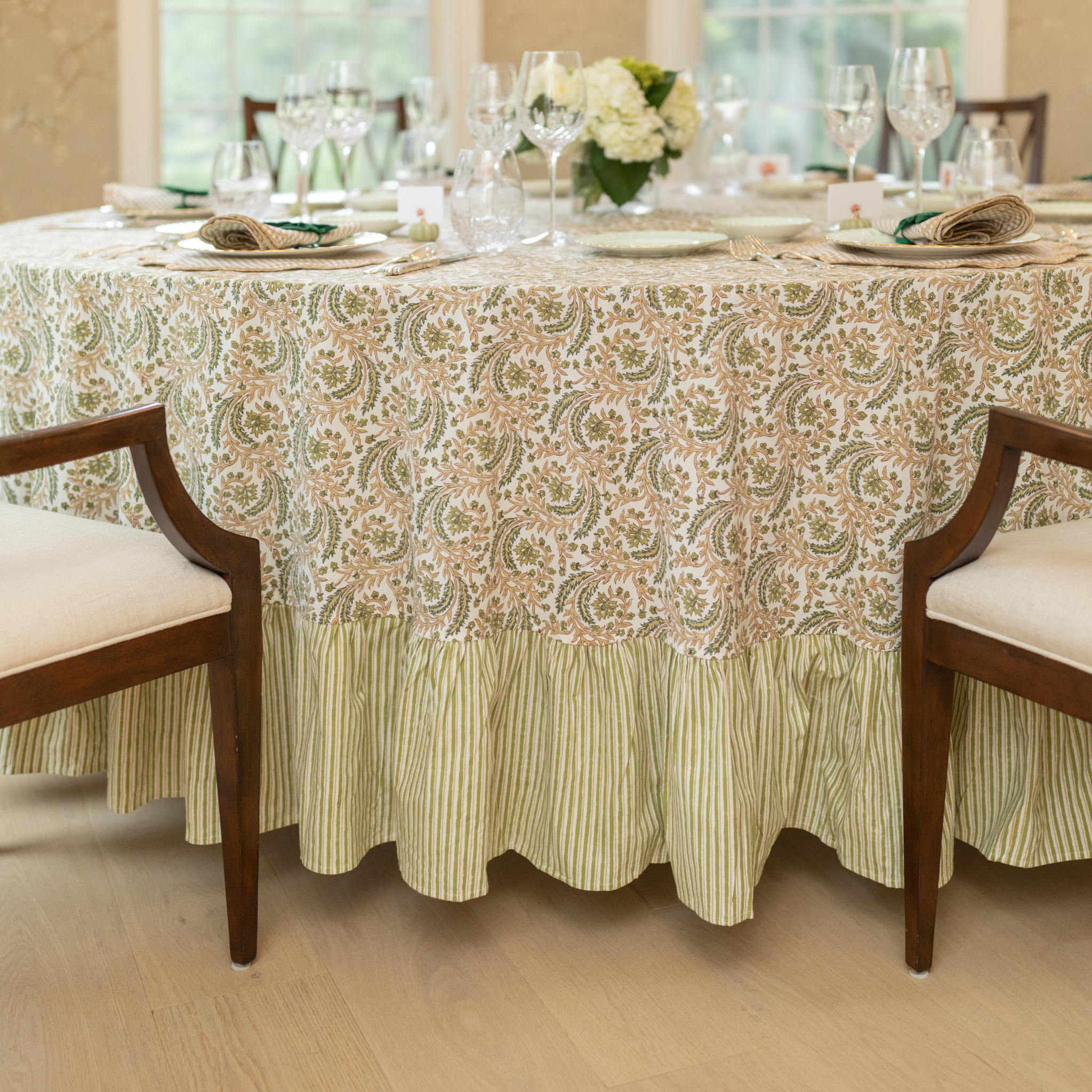 Harvest Fable tablecloth with green and gold block print, styled for Thanksgiving with gingham accents
