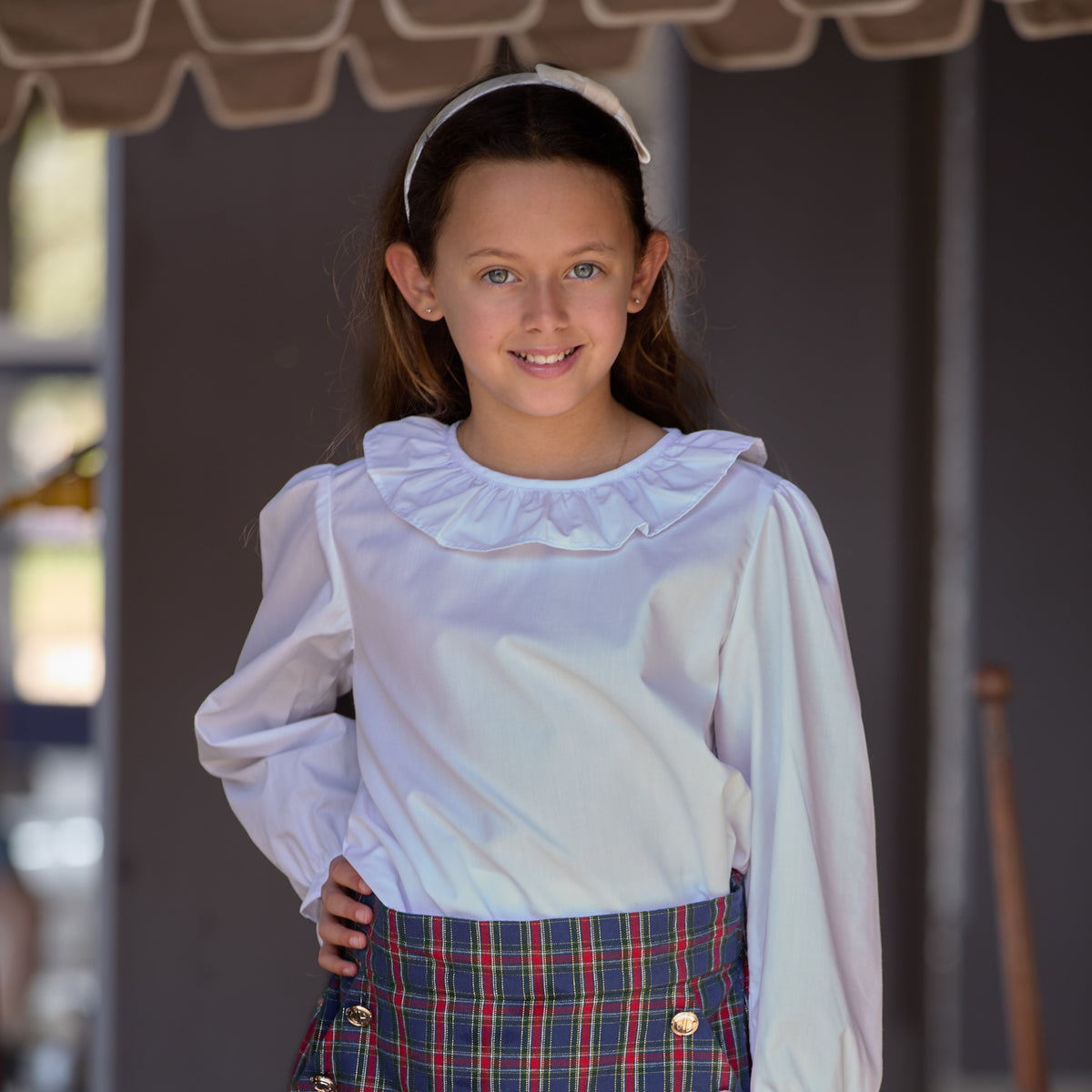 Henry Duvall Ruthie Ruffled Blouse for girls in Classic White, featuring a ruffle collar, long sleeves, and ruffled cuffs for fall and winter layering.