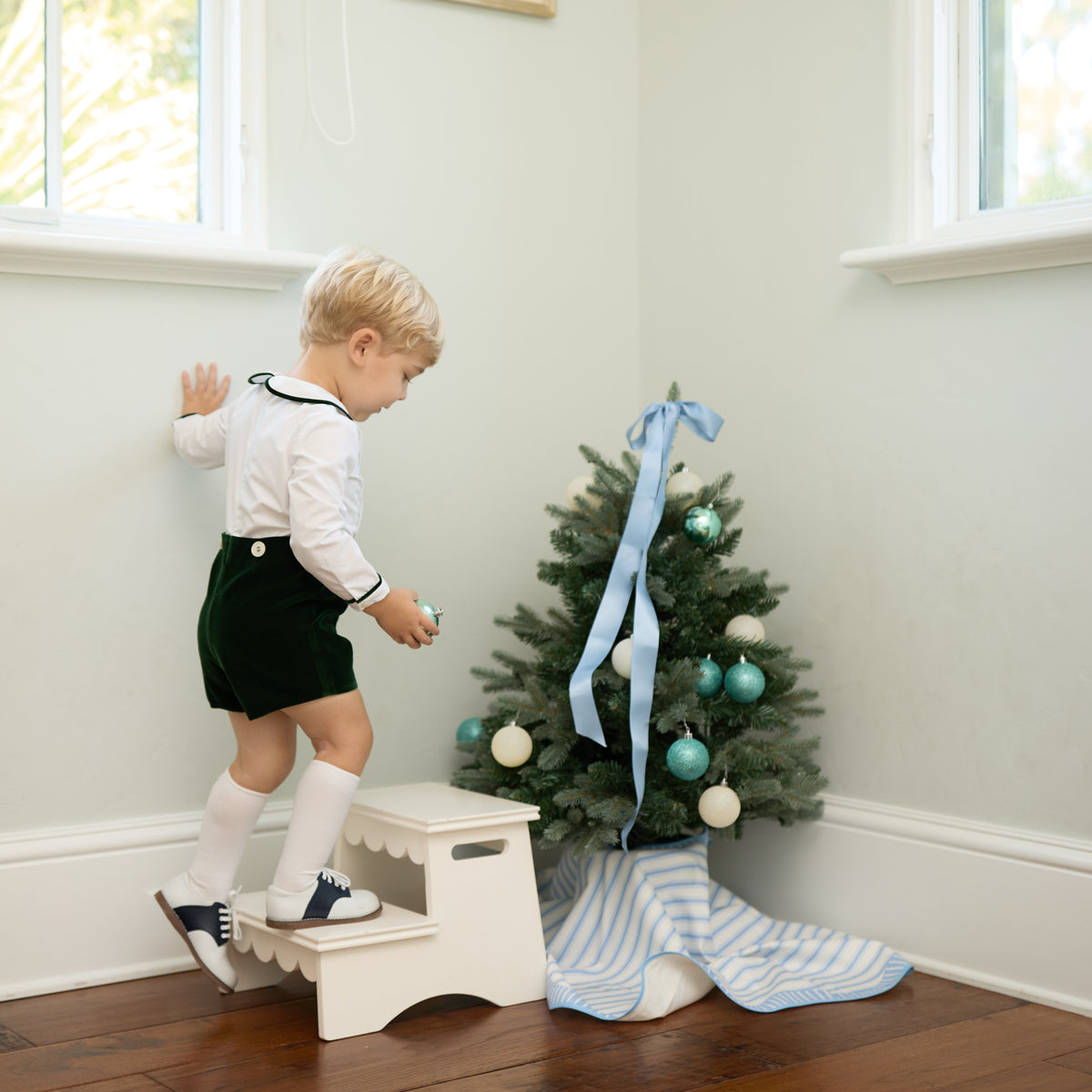 Classic white nylon knee high socks for girls and toddlers, lightweight with ribbed stay-up top, designed for comfort and perfect fit, ideal for pairing with Mary Janes or dress shoes from Henry Duvall’s Fall Collection