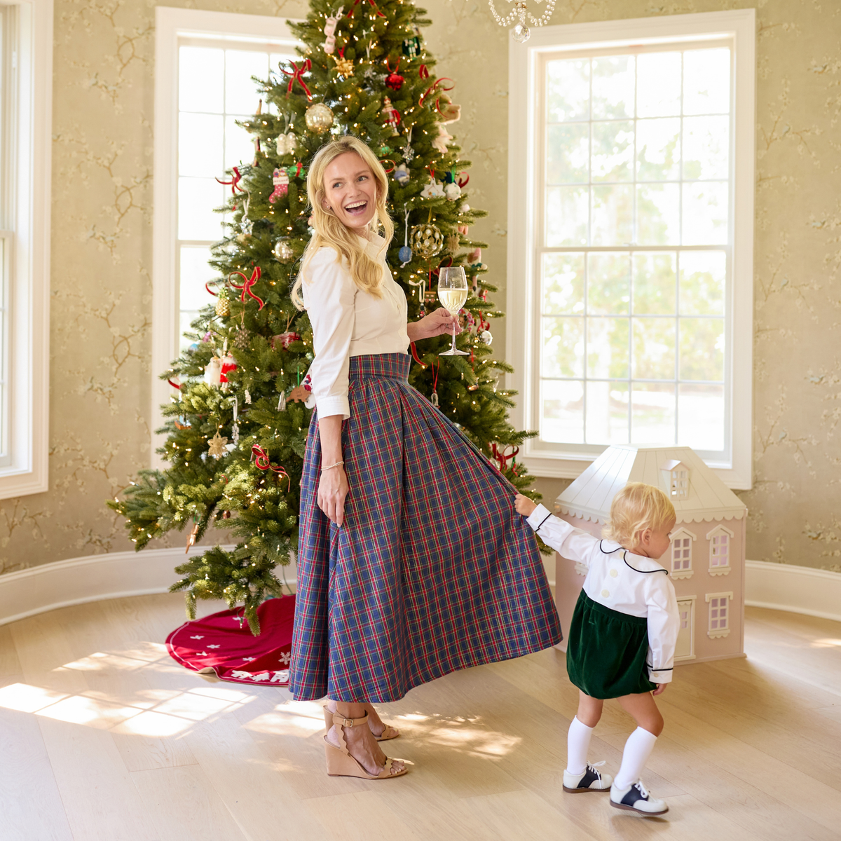 Women’s Audrey Skirt in navy, red, and green Tinsel Tartan with subtle metallic thread, featuring a full gathered midi-length silhouette.