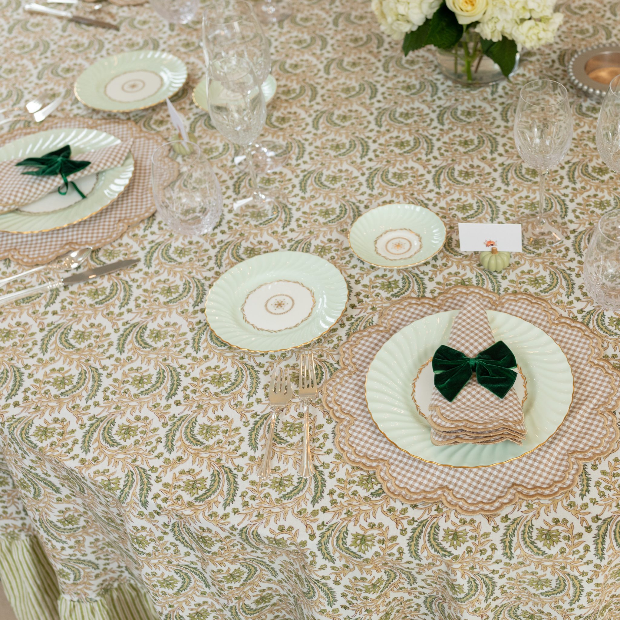 Wheat gingham placemat with scalloped edge embroidery, styled for a classic Thanksgiving table