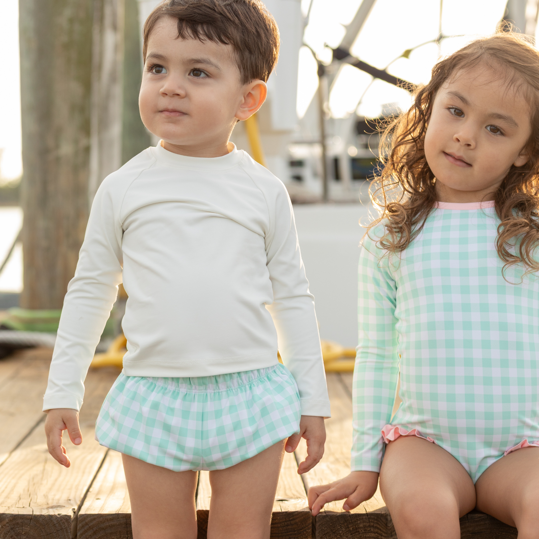 Baby boy swim bloomers in Seaside Seersucker with UPF 50+ protection; classic swim shorties with full coverage and elastic waist by Henry Duvall.