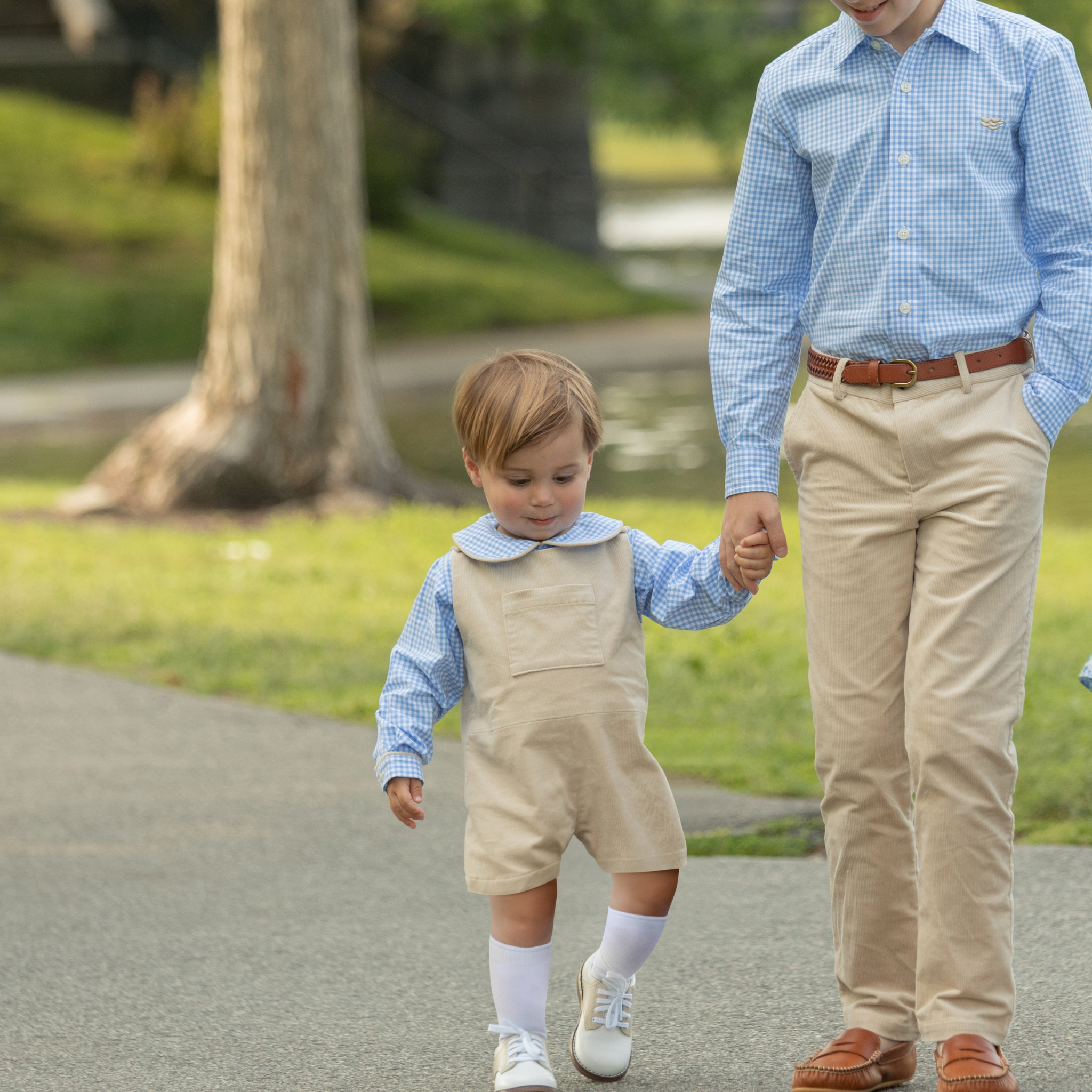 Henry Duvall Oliver Overalls in King’s Way Khaki Corduroy, classic toddler boys fall outfit with relaxed fit, perfect for layering with Peter Pan shirts or coordinating sibling looks