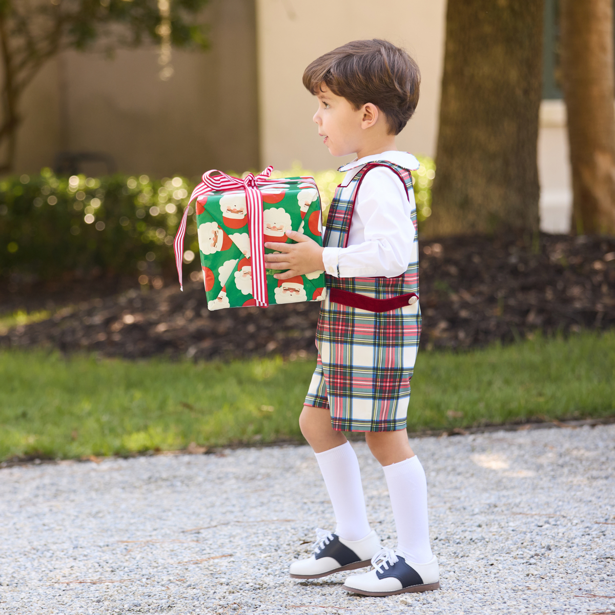 James Henry Jon Jon in Townsend Tartan, a red and green plaid holiday outfit for baby and toddler boys with red velvet trim and gold buttons.