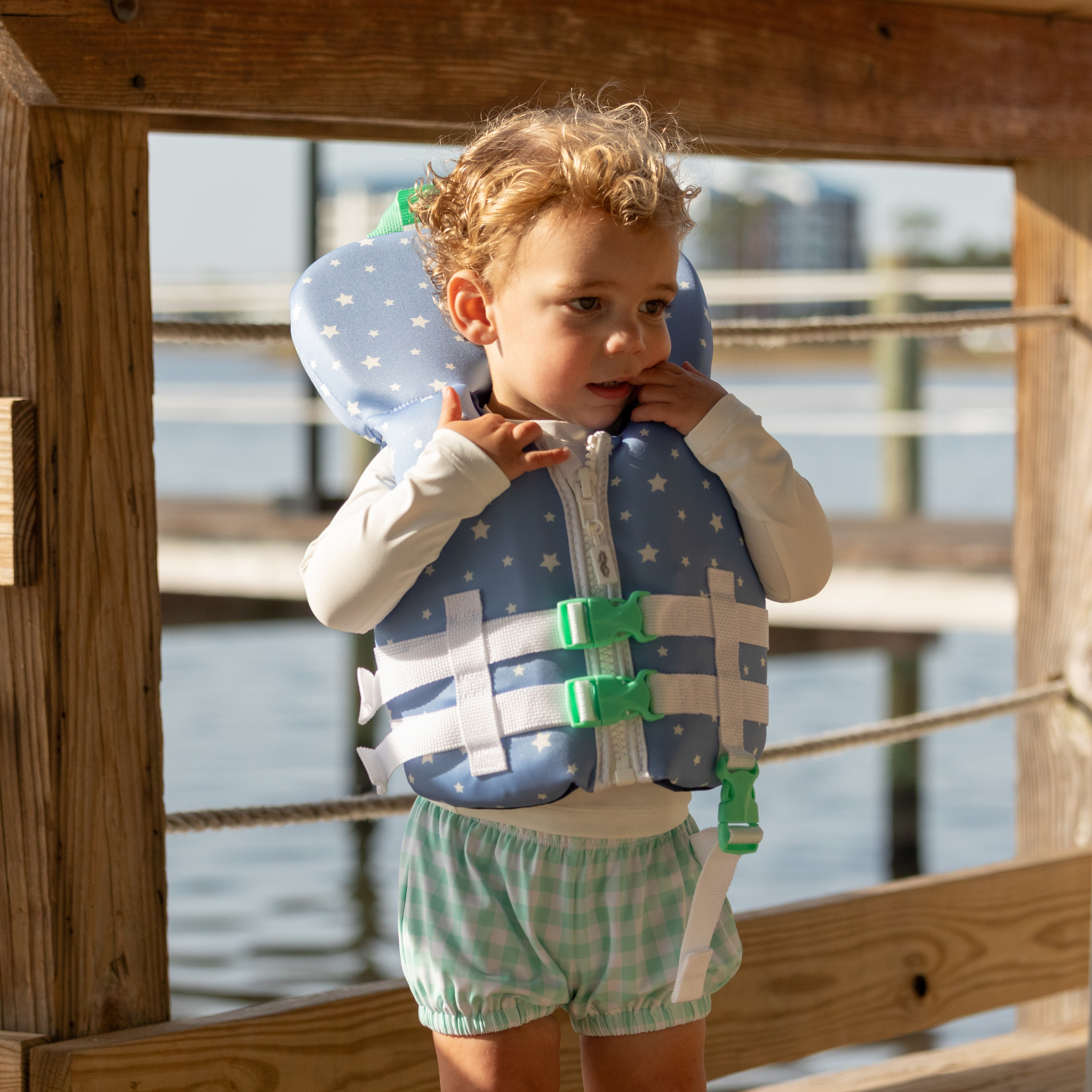 Baby boy swim bloomers in Seaside Seersucker with UPF 50+ protection; classic swim shorties with full coverage and elastic waist by Henry Duvall.