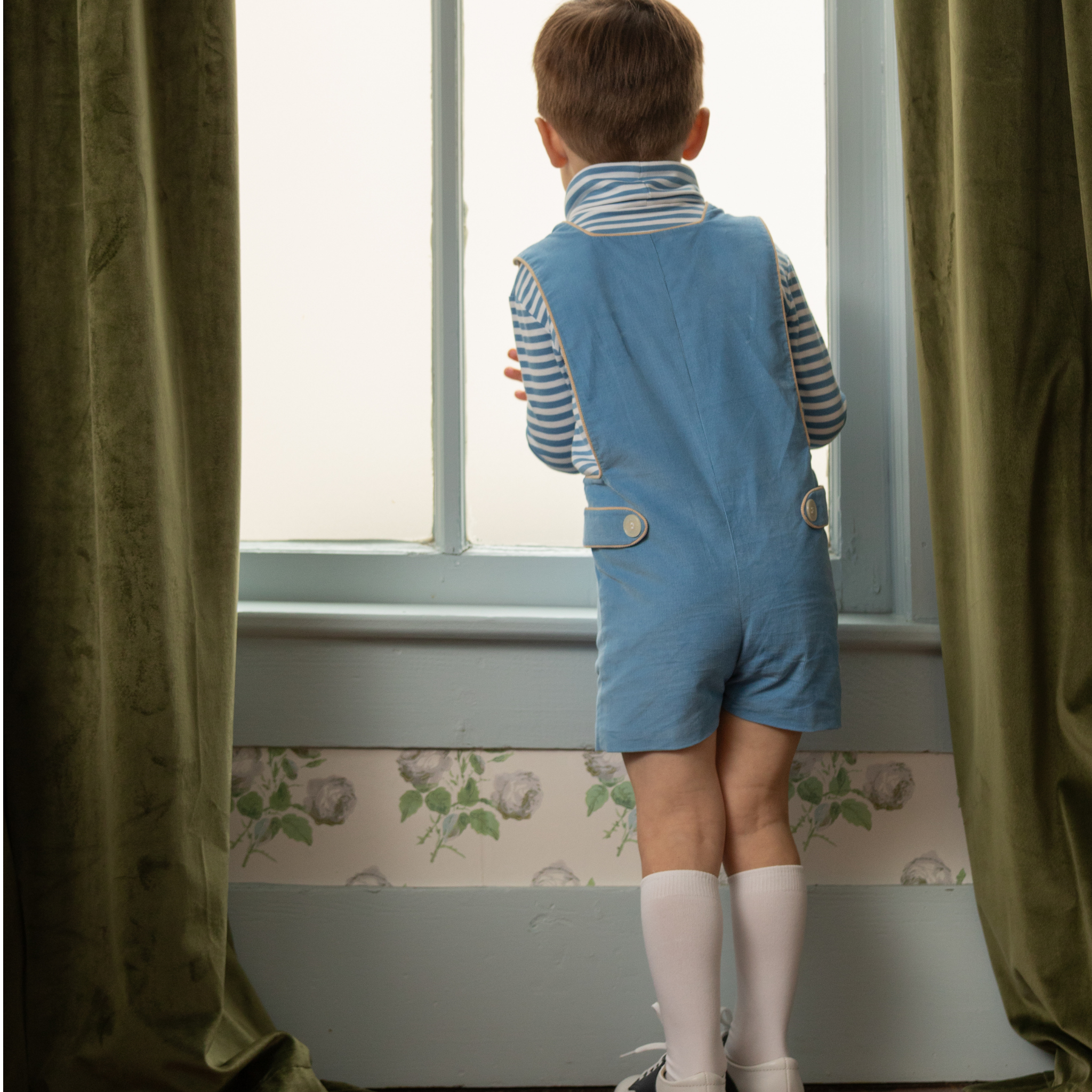 Henry Duvall James Henry Jon Jon for baby and toddler boys in Brookhaven Blue corduroy with contrasting King’s Way Khaki corduroy trim, a classic fall outfit for layering, family photos, Thanksgiving, church, and everyday wear.
