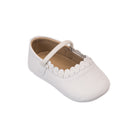 Elephantito baby ballet flats in white calfskin with scalloped trim and elastic strap, classic crib shoes for girls to pair with Henry Duvall outfits for portraits and baby showers.