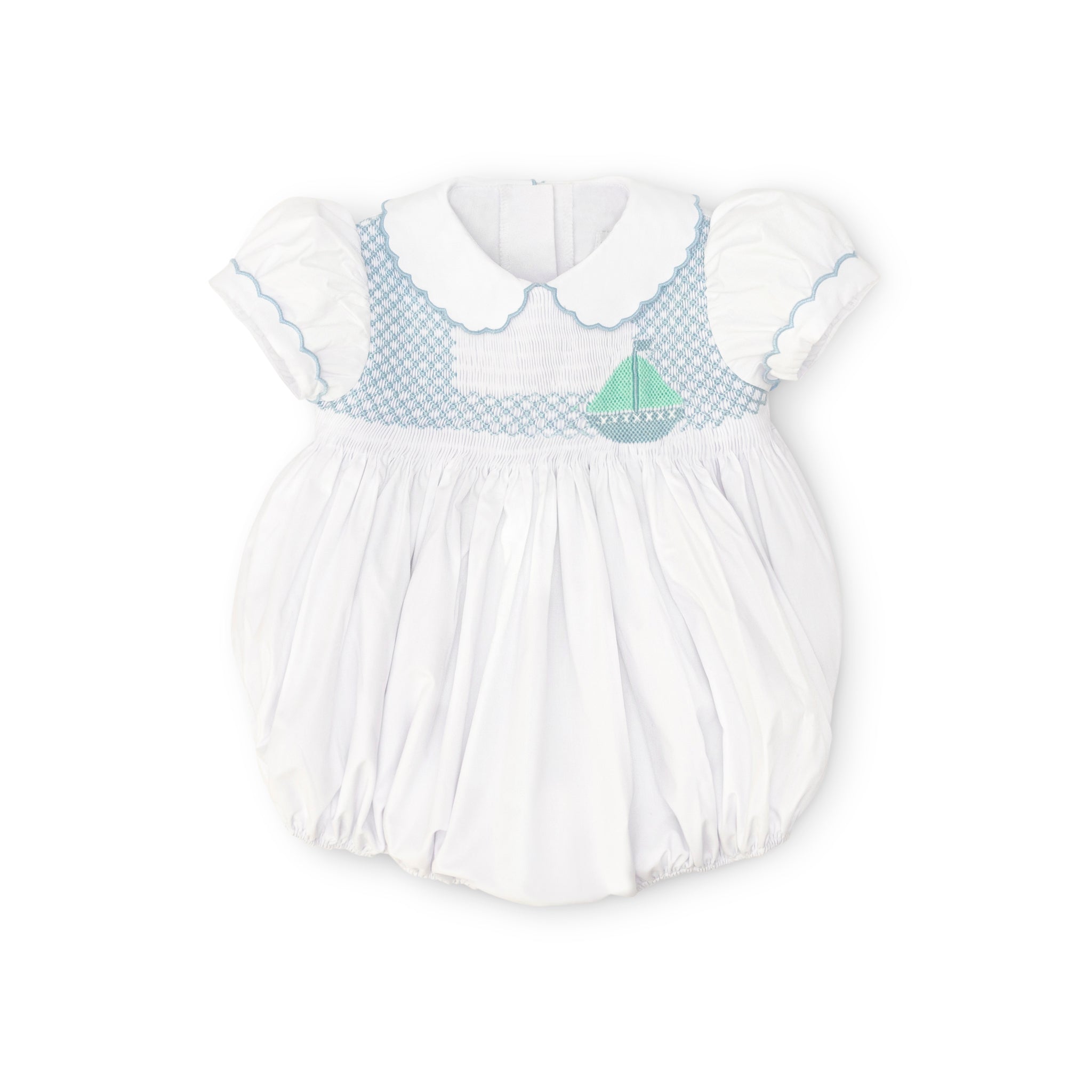 Henry Duvall Eloise Bubble in white cotton with Bailey’s Bay Blue trim and hand-smocked sailboats, classic heirloom baby girl summer outfit with scalloped Peter Pan collar