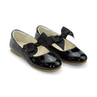 Girls patent leather Mary Jane flats by L’Amour with grosgrain bow elastic strap, perfect for fall parties, portraits, and coordinating with Henry Duvall dresses