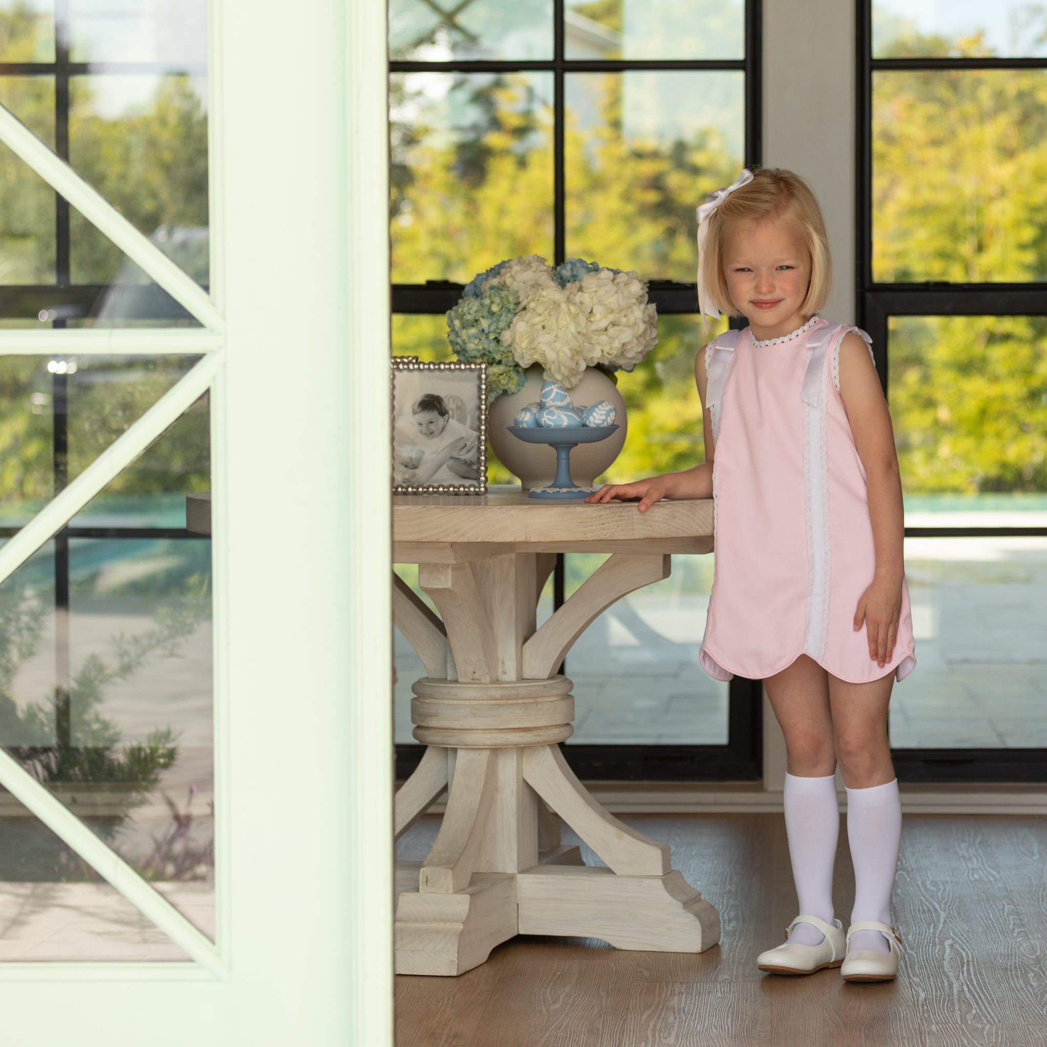 Classic white nylon knee high socks for girls and toddlers, lightweight with ribbed stay-up top, designed for comfort and perfect fit, ideal for pairing with Mary Janes or dress shoes from Henry Duvall’s Fall Collection