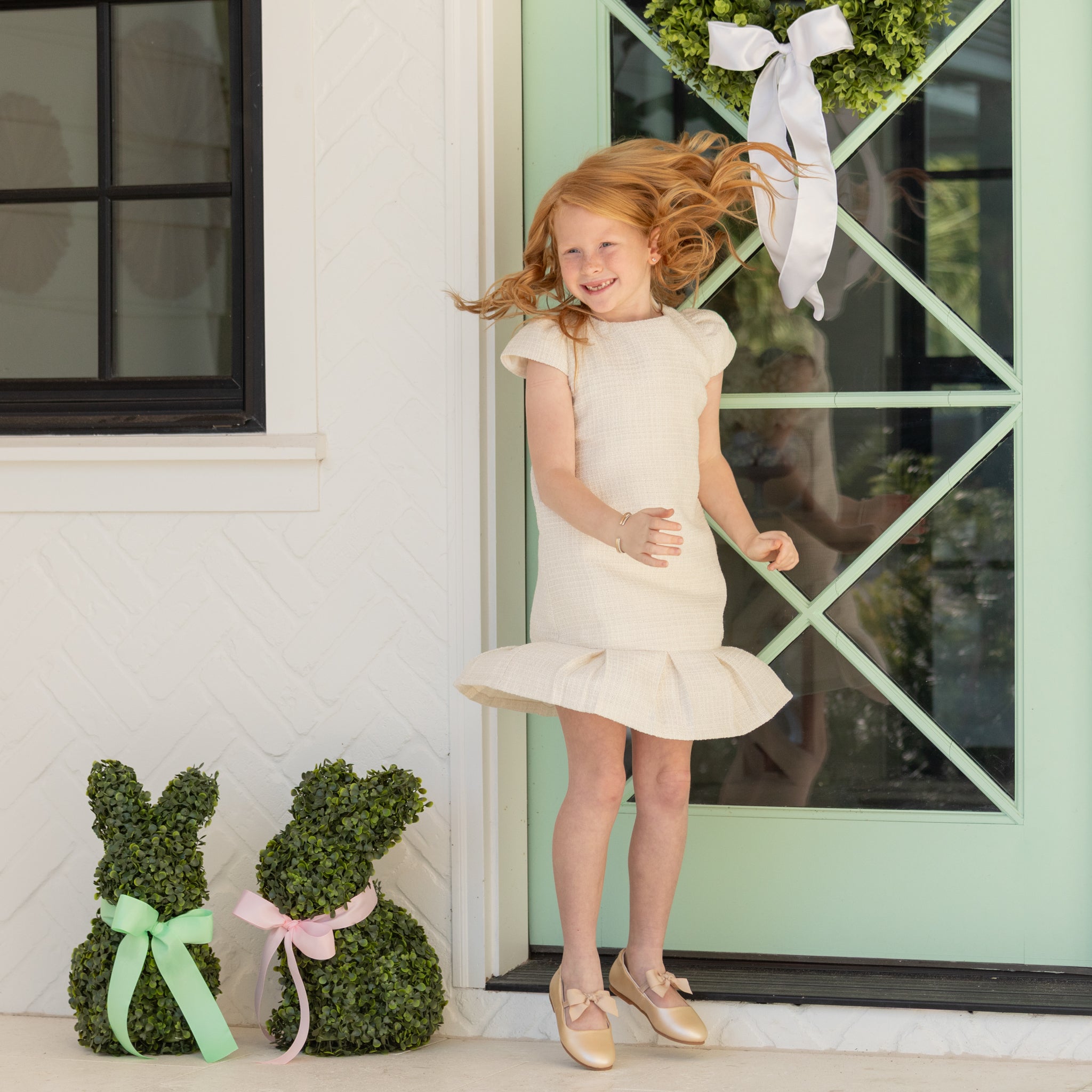 Girl wearing the Henry Duvall Charlotte Dress, a polished older girls dress designed for special occasions and coordinated family looks.