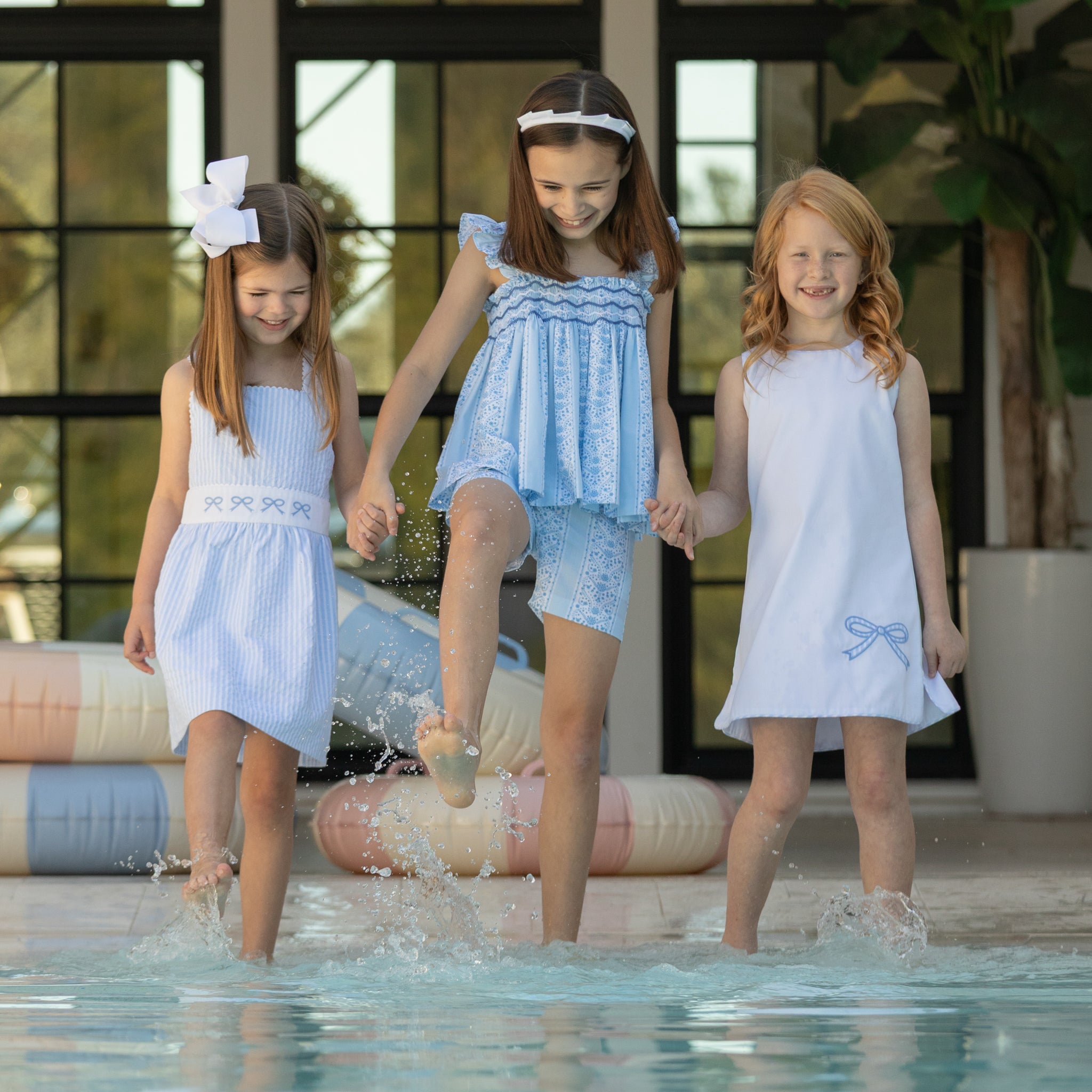Girl wearing the Henry Duvall Schuyler Dress, a classic girls shift dress designed for summer outings and sibling matching.