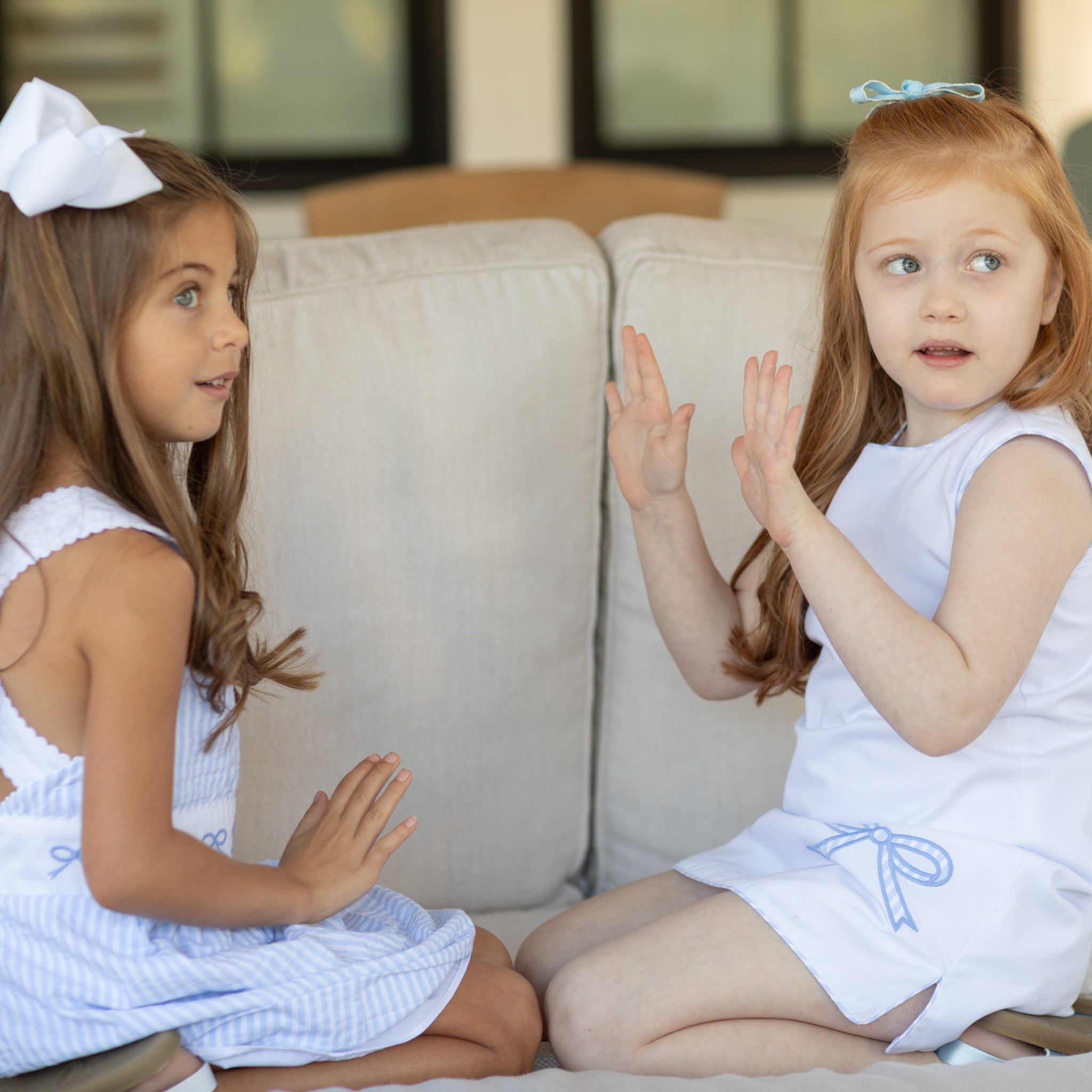 Girl wearing the Henry Duvall Schuyler Dress, a classic girls shift dress designed for summer outings and sibling matching.