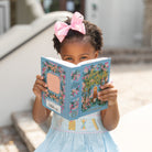 Henry Duvall Leila Dress with back-to-school embroidery, classic blue girls cotton dress with pink trim and heirloom stitching featuring crayons, scissors, and pencils