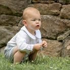 Classic baby boy bubble romper in blue gray herringbone fabric, inspired by English heritage style, heirloom-quality traditional boys clothing for portraits, holidays, and special occasions