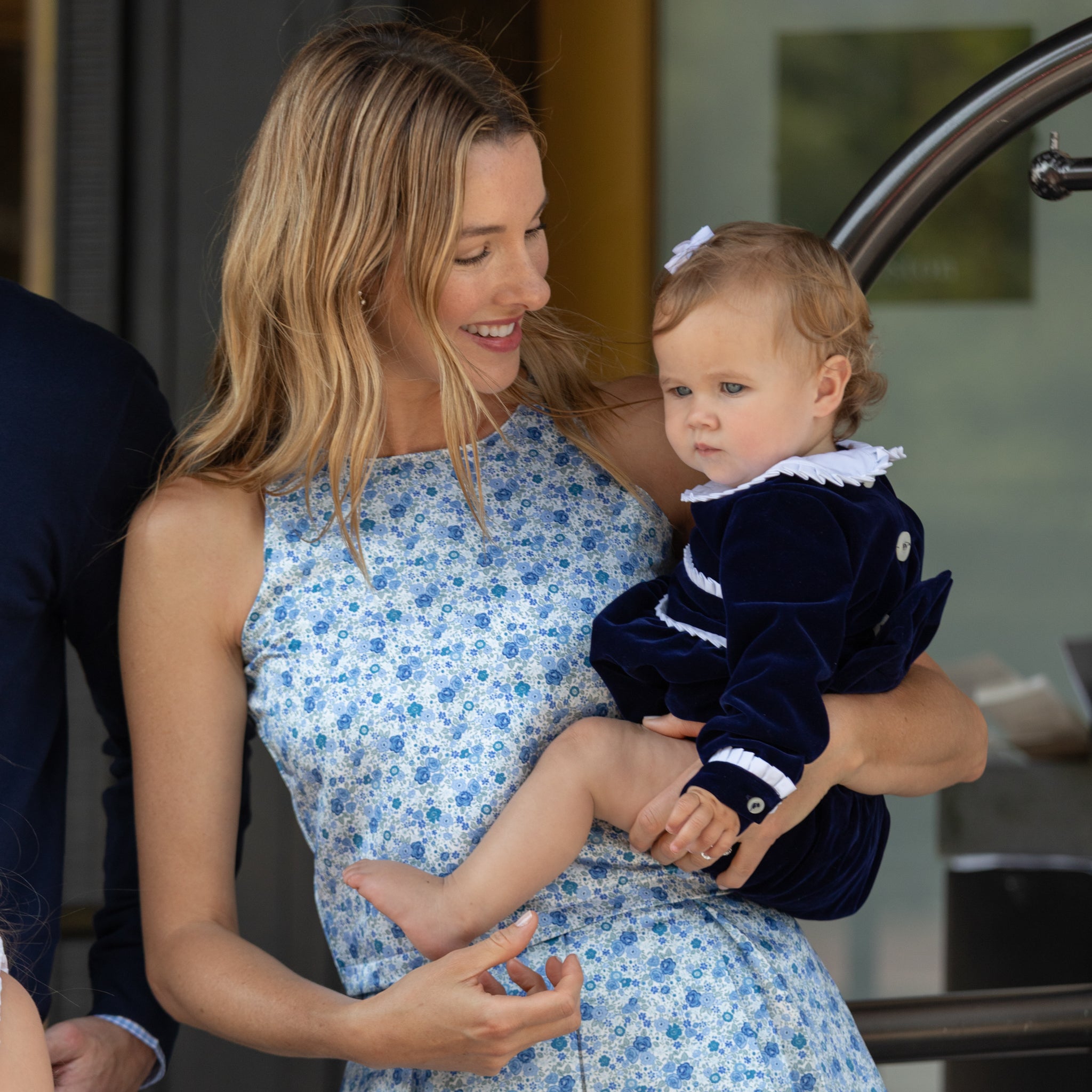 Baby girls navy velvet bubble with white pleated detailing and pre-tied bow, long sleeve fall outfit for special occasions and family photos by Henry Duvall