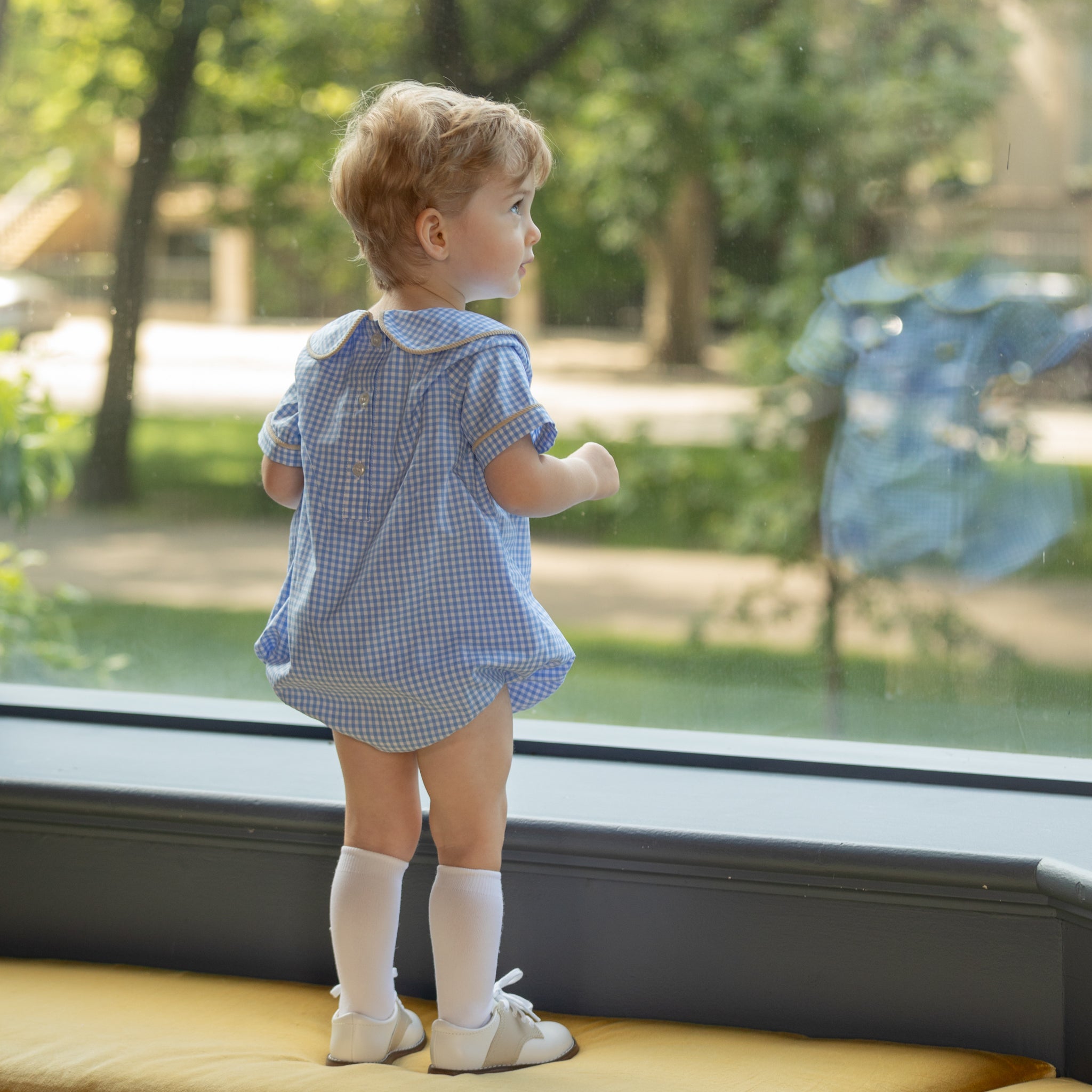 Henry Duvall Banks Bubble in classic blue Charles Street Check with King’s Way Khaki Corduroy trim, classic fall baby boy outfit with covered buttons and diaper snaps