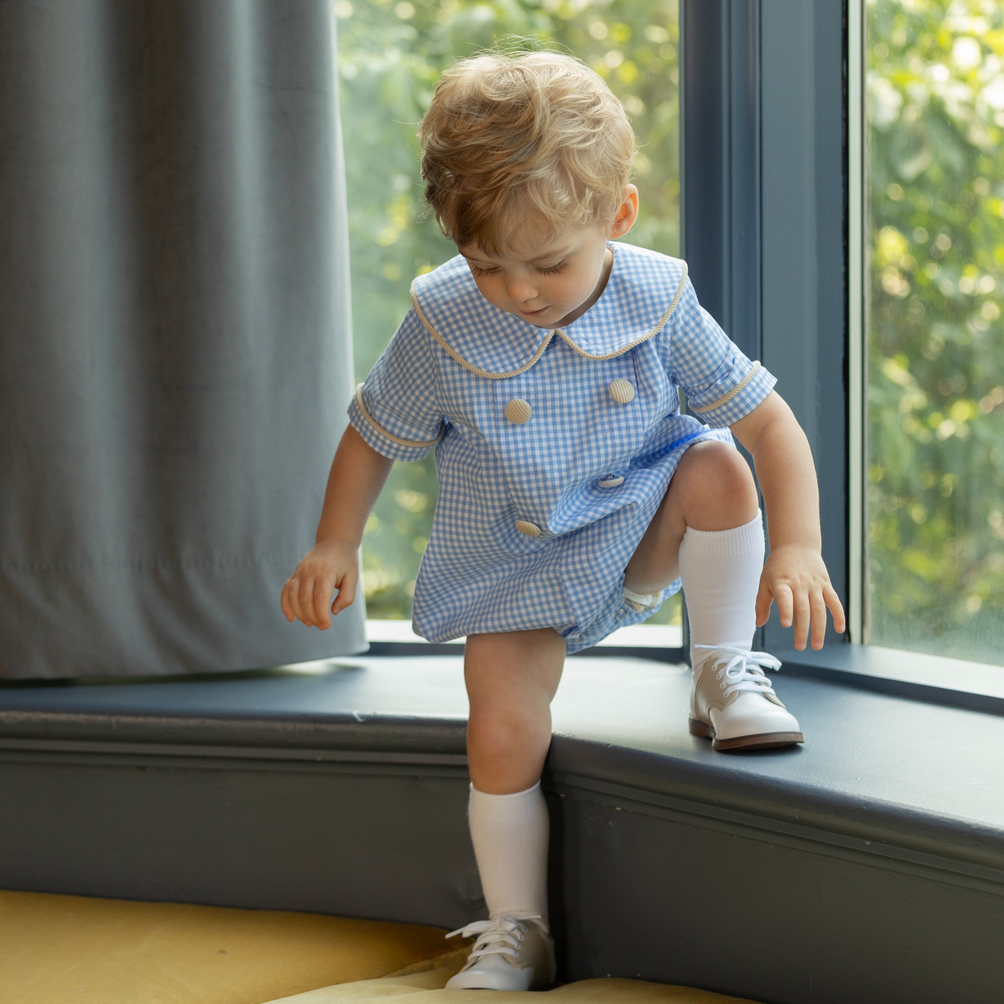 Henry Duvall Banks Bubble in classic blue Charles Street Check with King’s Way Khaki Corduroy trim, classic fall baby boy outfit with covered buttons and diaper snaps