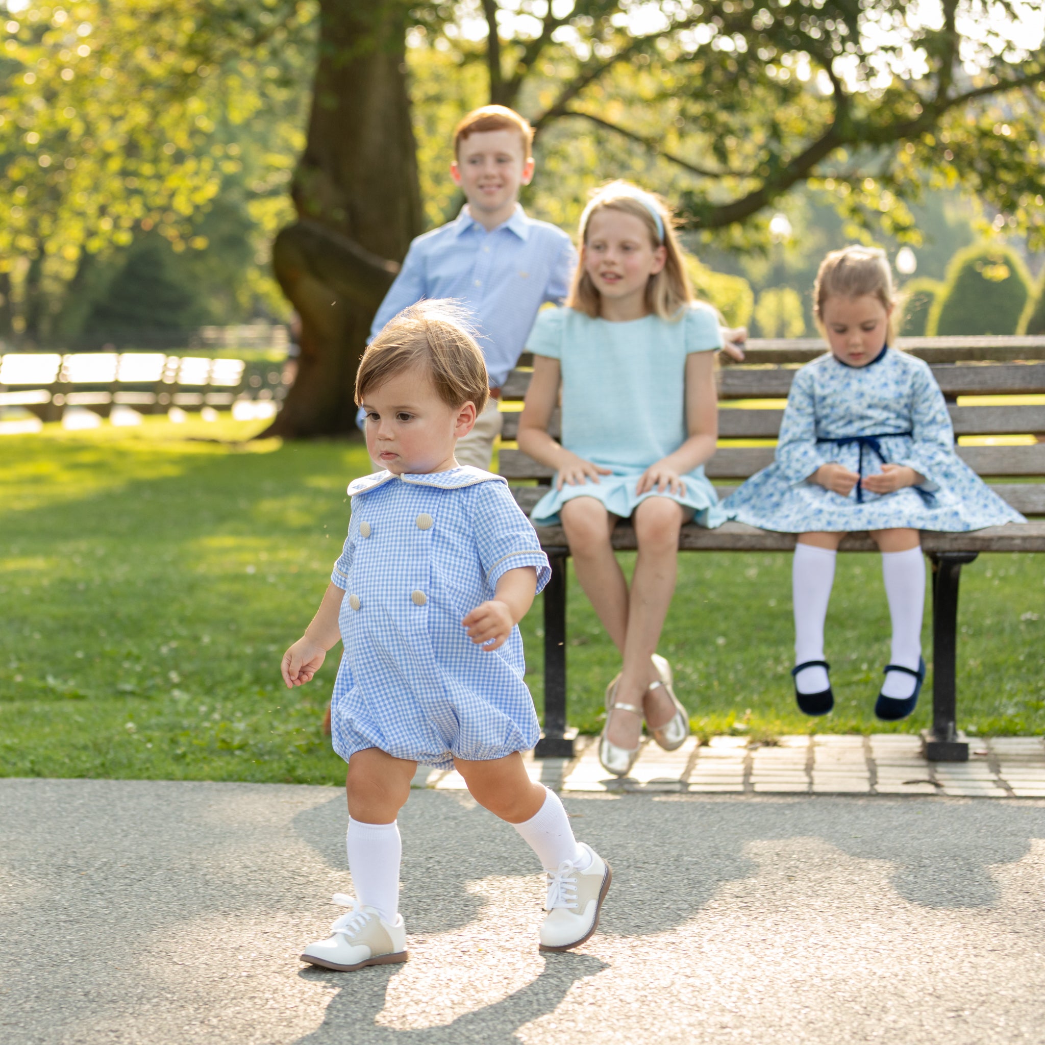 Henry Duvall Banks Bubble in classic blue Charles Street Check with King’s Way Khaki Corduroy trim, classic fall baby boy outfit with covered buttons and diaper snaps