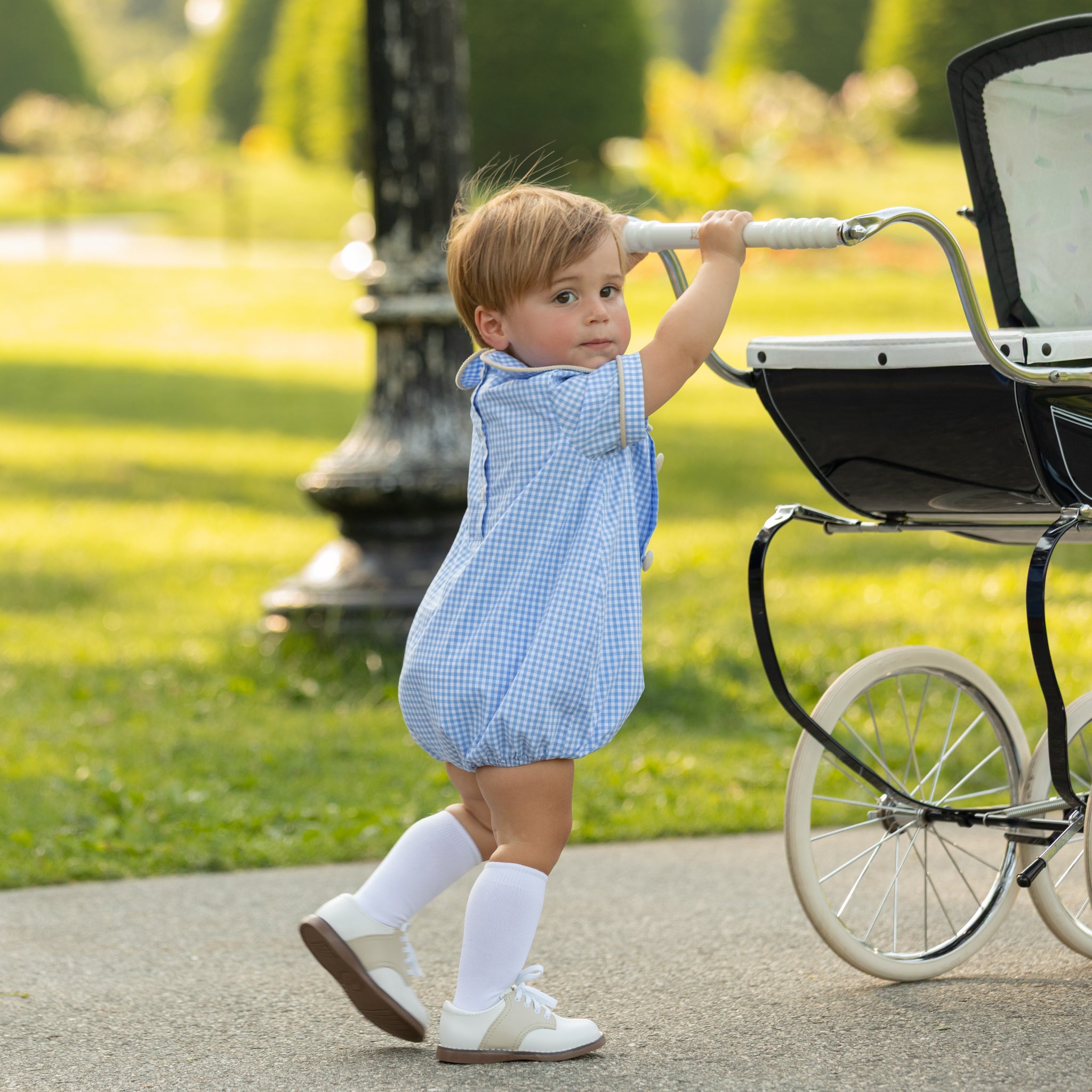 Henry Duvall Banks Bubble in classic blue Charles Street Check with King’s Way Khaki Corduroy trim, classic fall baby boy outfit with covered buttons and diaper snaps