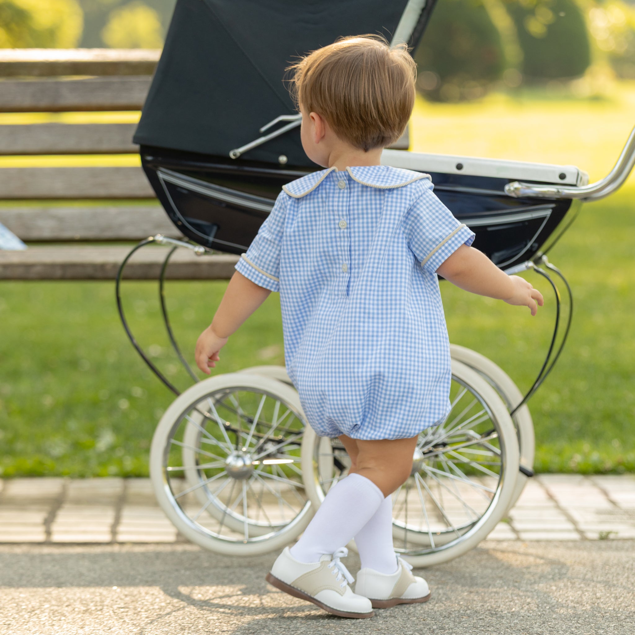 Henry Duvall Banks Bubble in classic blue Charles Street Check with King’s Way Khaki Corduroy trim, classic fall baby boy outfit with covered buttons and diaper snaps