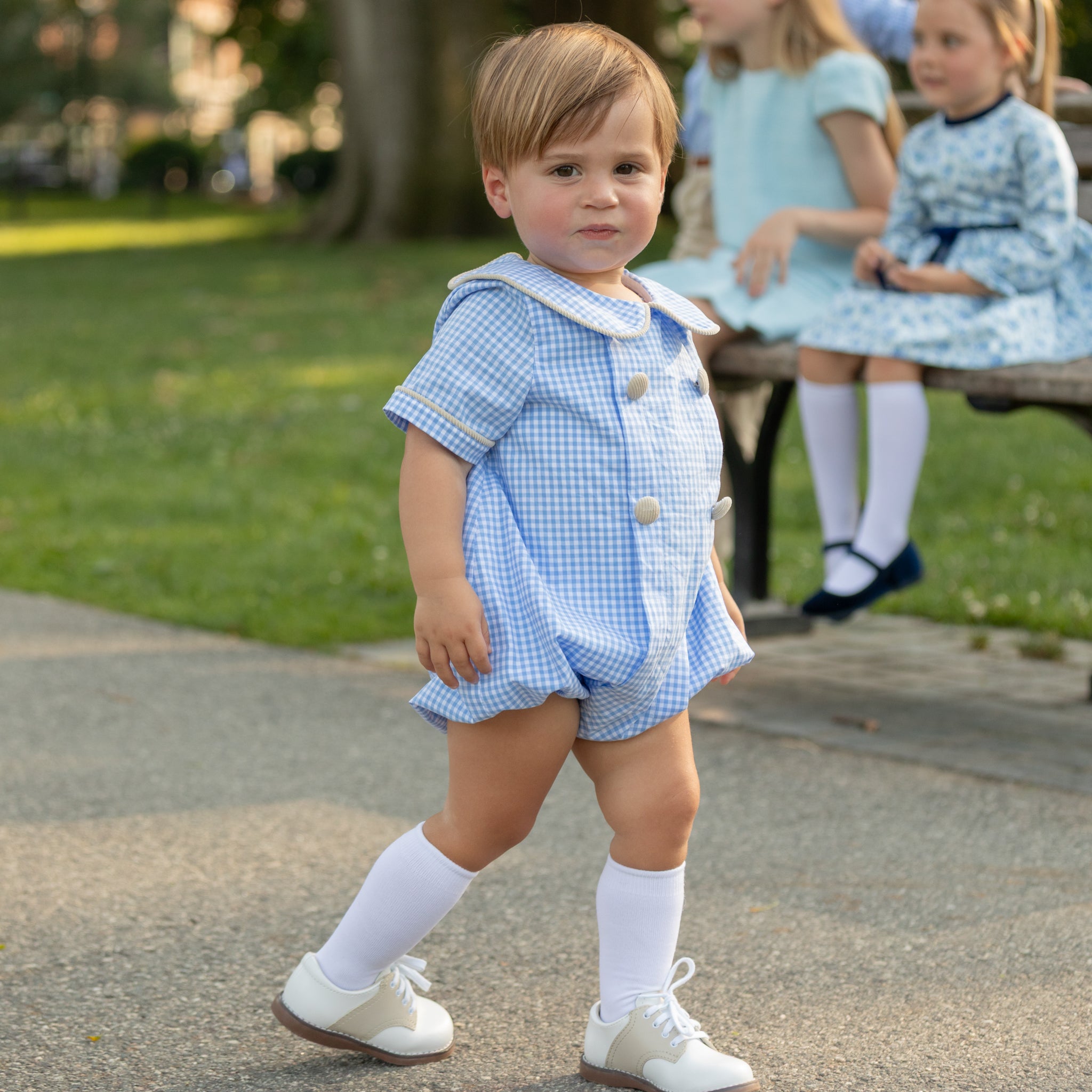 Henry Duvall Banks Bubble in classic blue Charles Street Check with King’s Way Khaki Corduroy trim, classic fall baby boy outfit with covered buttons and diaper snaps