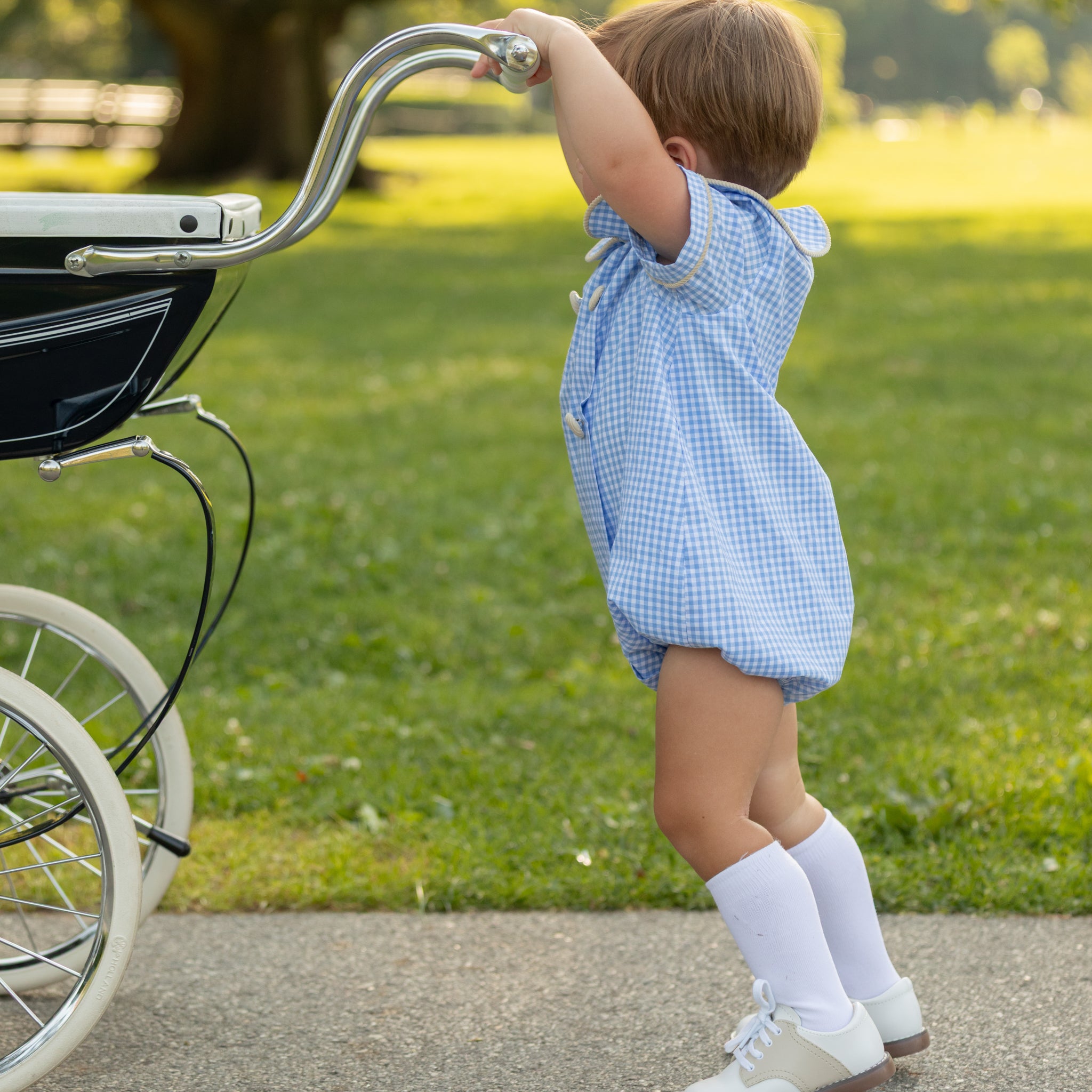 Henry Duvall Banks Bubble in classic blue Charles Street Check with King’s Way Khaki Corduroy trim, classic fall baby boy outfit with covered buttons and diaper snaps