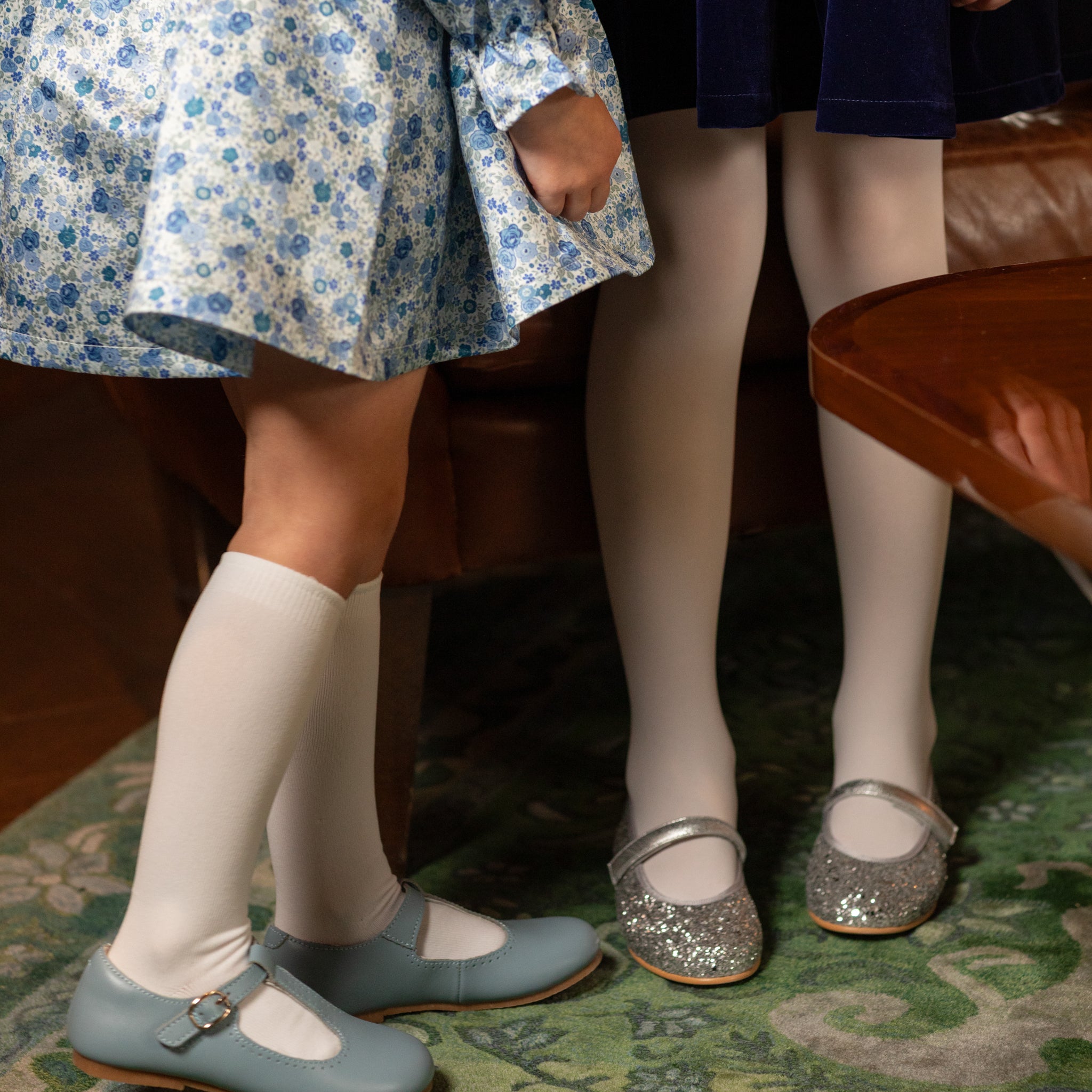 Classic white nylon knee high socks for girls and toddlers, lightweight with ribbed stay-up top, designed for comfort and perfect fit, ideal for pairing with Mary Janes or dress shoes from Henry Duvall’s Fall Collection
