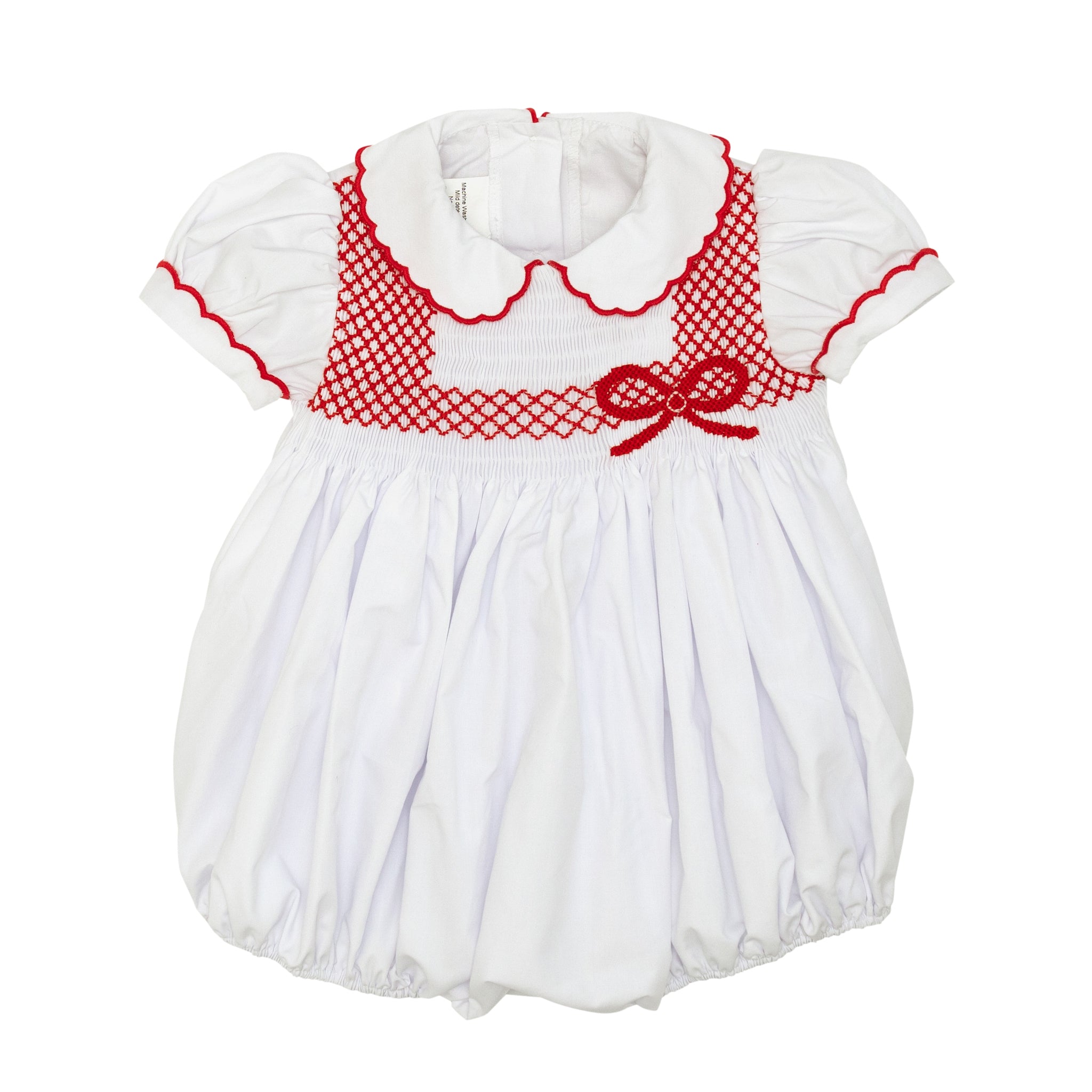 White short sleeve baby girl holiday bubble with red smocked bows, Peter Pan collar, and piped cuffs, classic Eloise Bubble by Henry Duvall for Christmas and winter celebrations