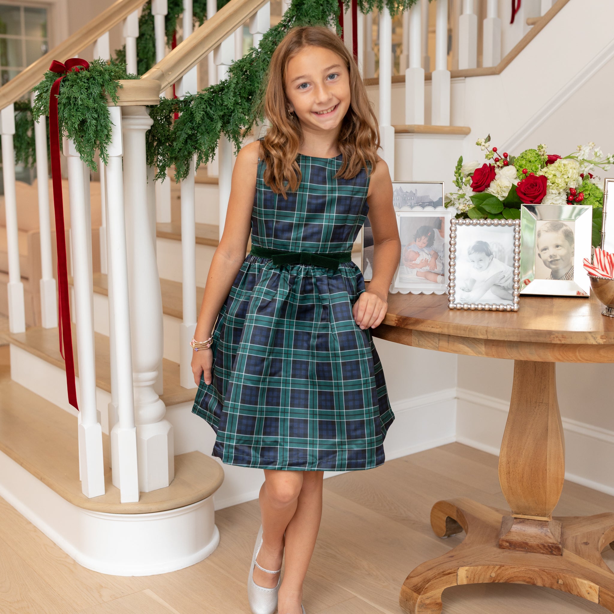 Teen girl holiday dress in Newbury Tartan with green velvet trim, classic A-line silhouette, perfect for family photos and festive gatherings
