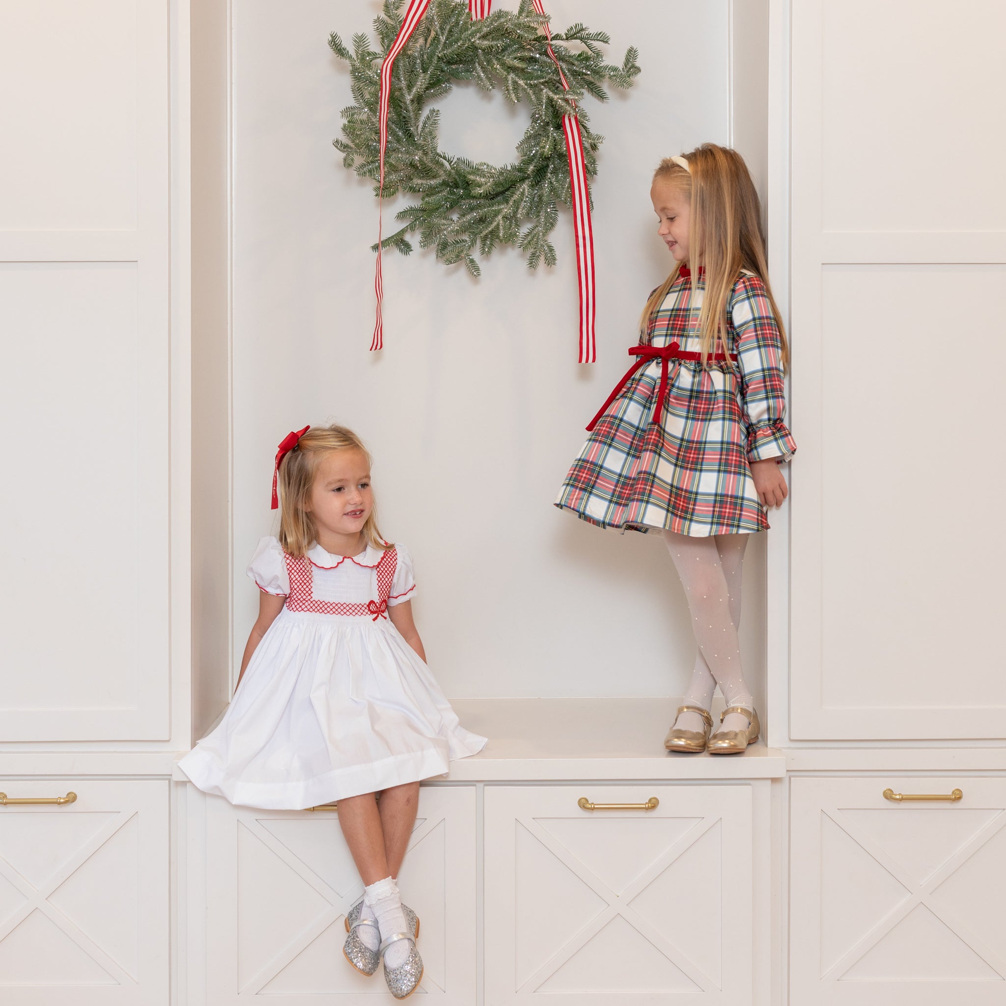 Girl's plaid holiday dress in Townsend Tartan with bow waist detail, vintage-inspired fit, perfect for family photos and festive gatherings – Henry Duvall classic