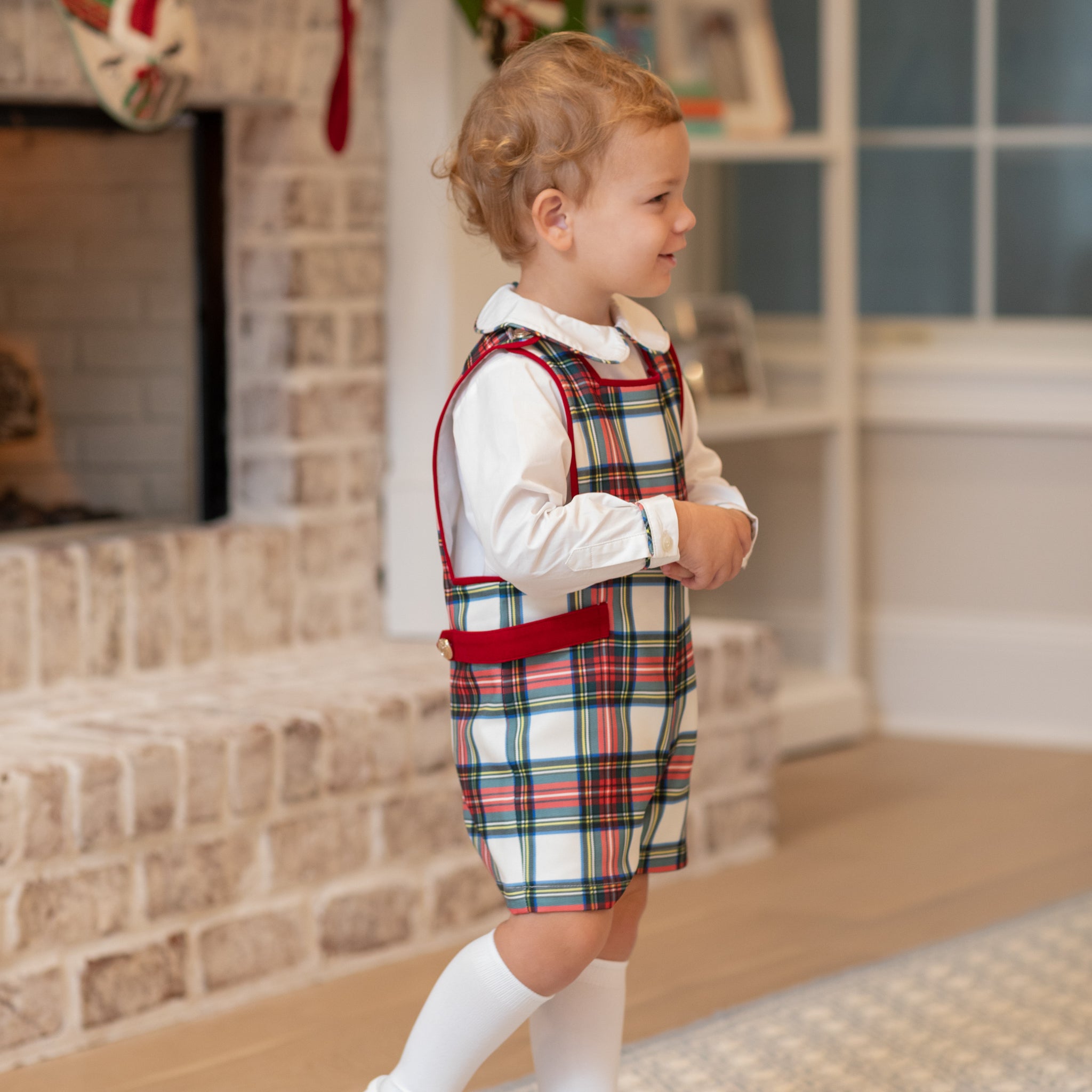 Henry Duvall classic baby boy jon jon in traditional red tartan, heirloom toddler outfit with shoulder buttons and stride snaps, inspired by English heritage style