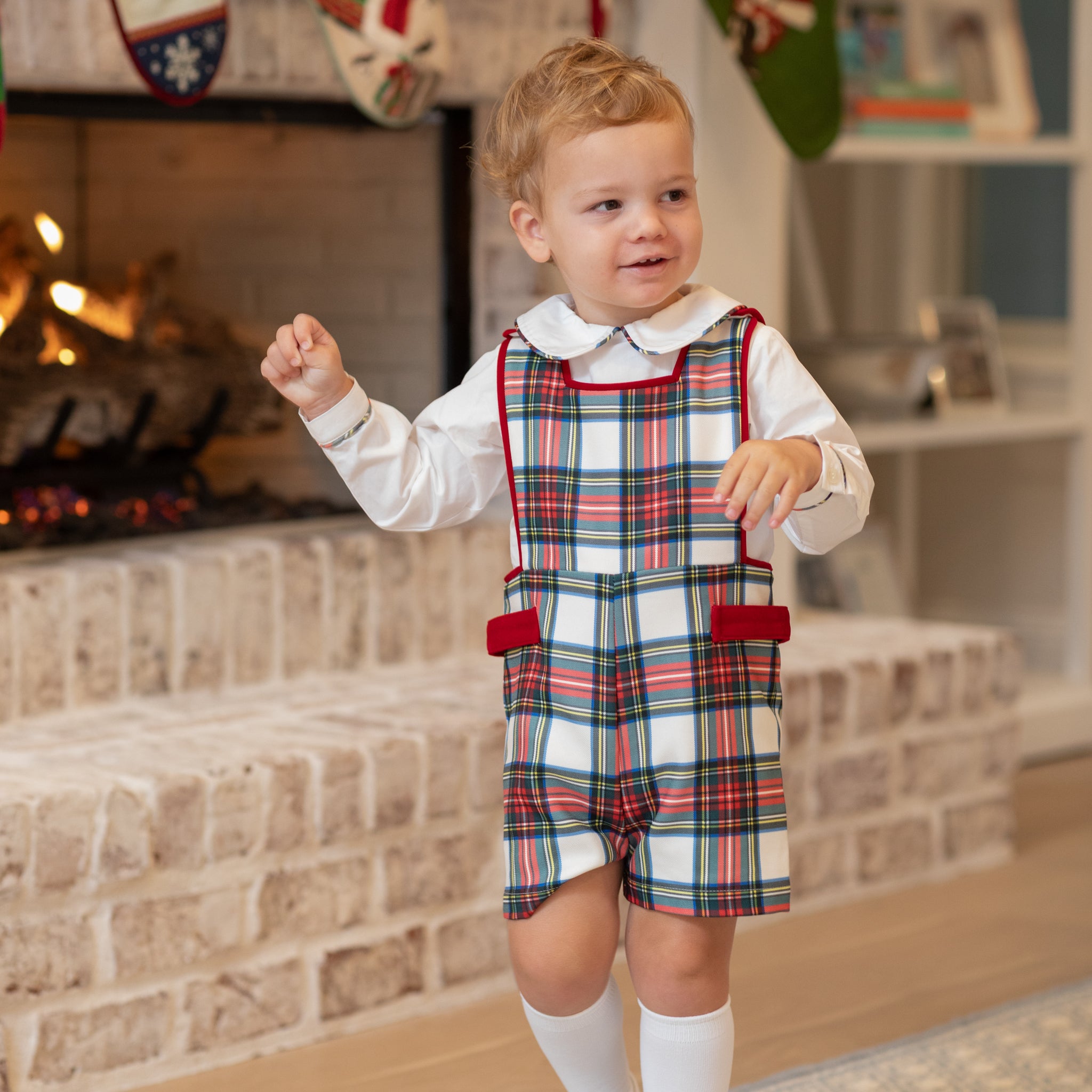 Henry Duvall classic baby boy jon jon in traditional red tartan, heirloom toddler outfit with shoulder buttons and stride snaps, inspired by English heritage style