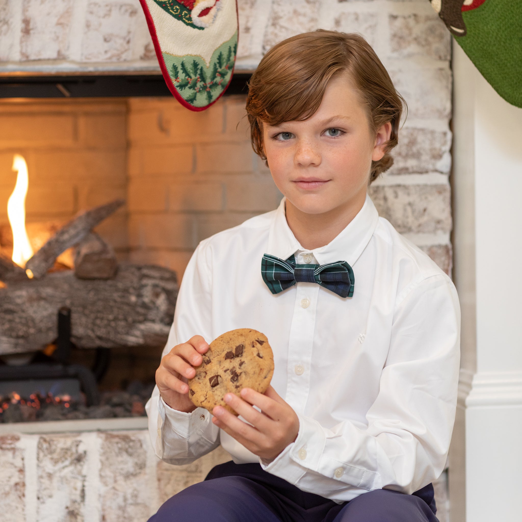 Boys’ adjustable pre-tied bow tie in classic green and navy Newbury Tartan – timeless holiday plaid accessory for festive dressing