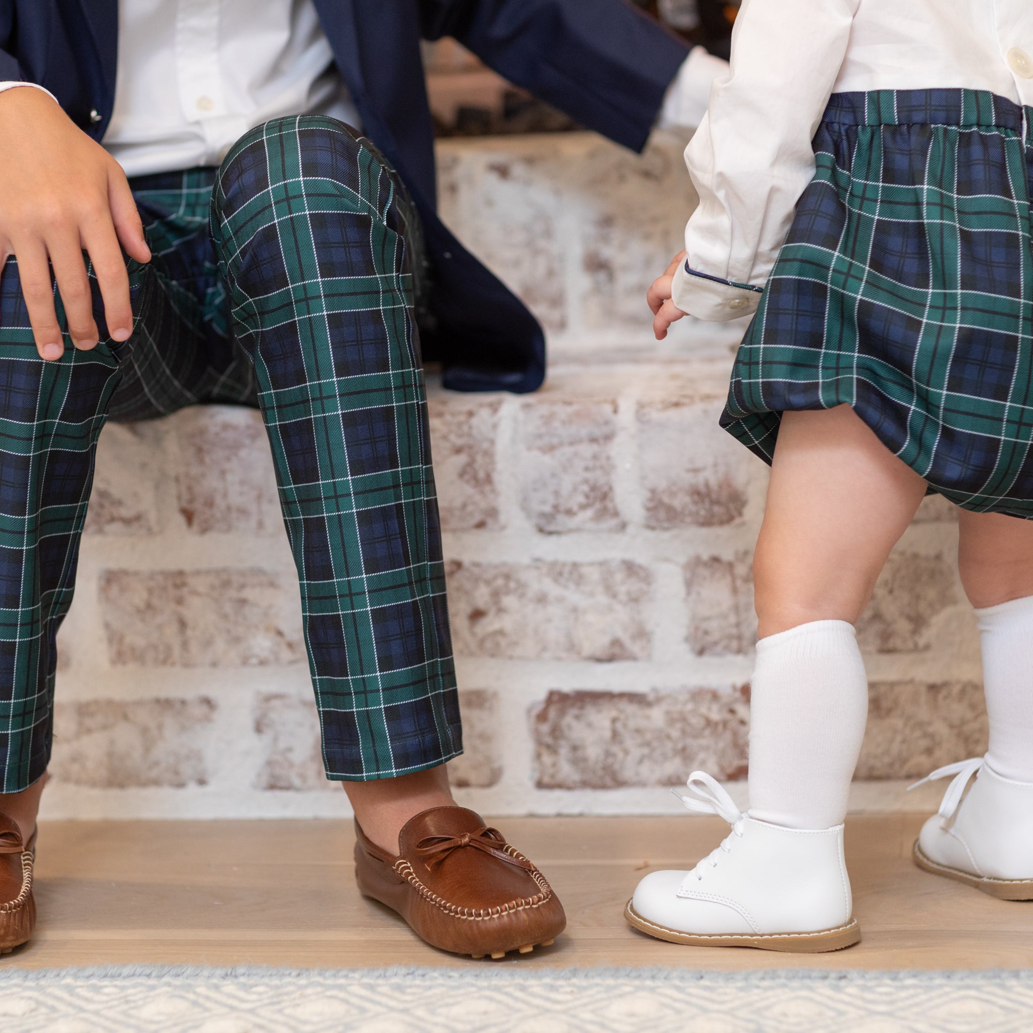 Boys holiday trousers in classic green and navy tartan, tailored Christmas pants for older boys with coordinating sibling outfits from Henry Duvall