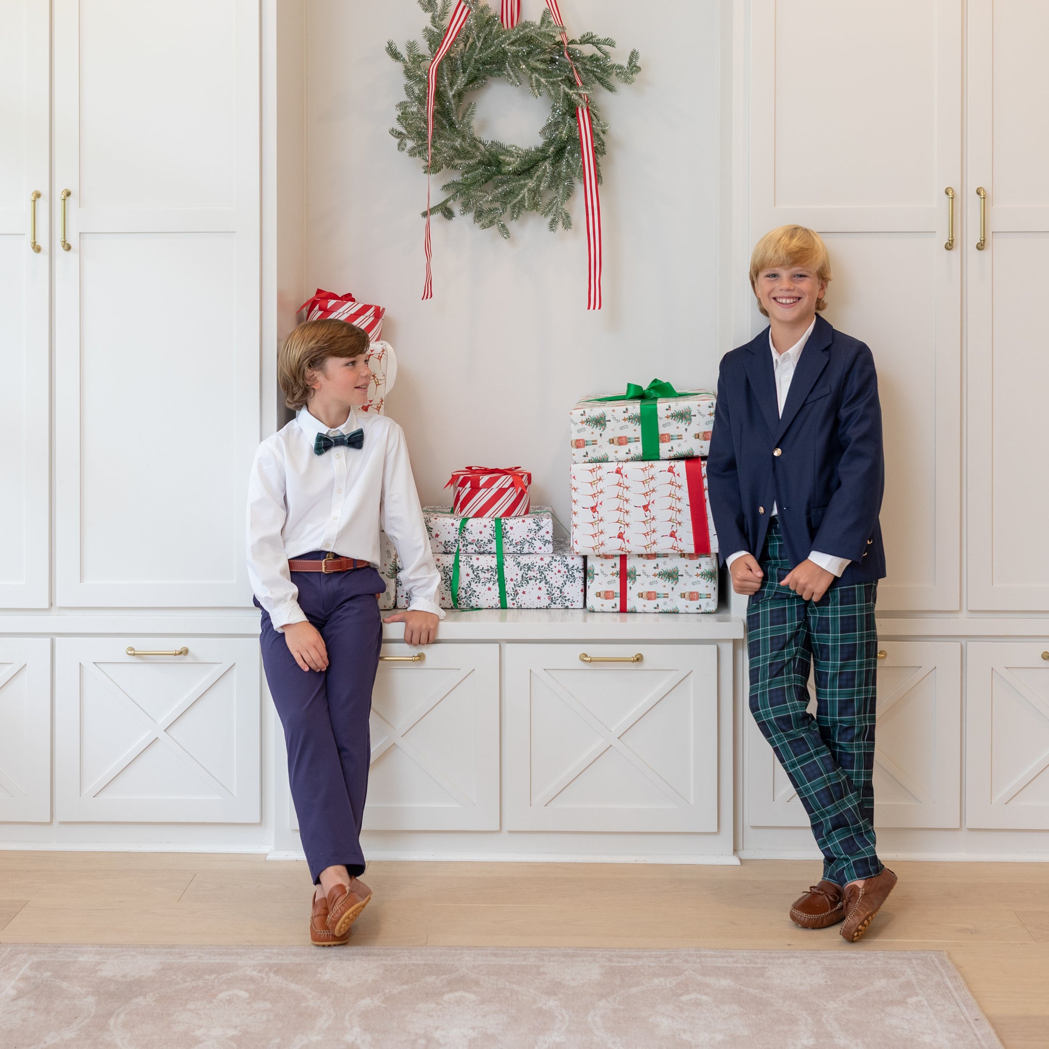 Boys holiday trousers in classic green and navy tartan, tailored Christmas pants for older boys with coordinating sibling outfits from Henry Duvall