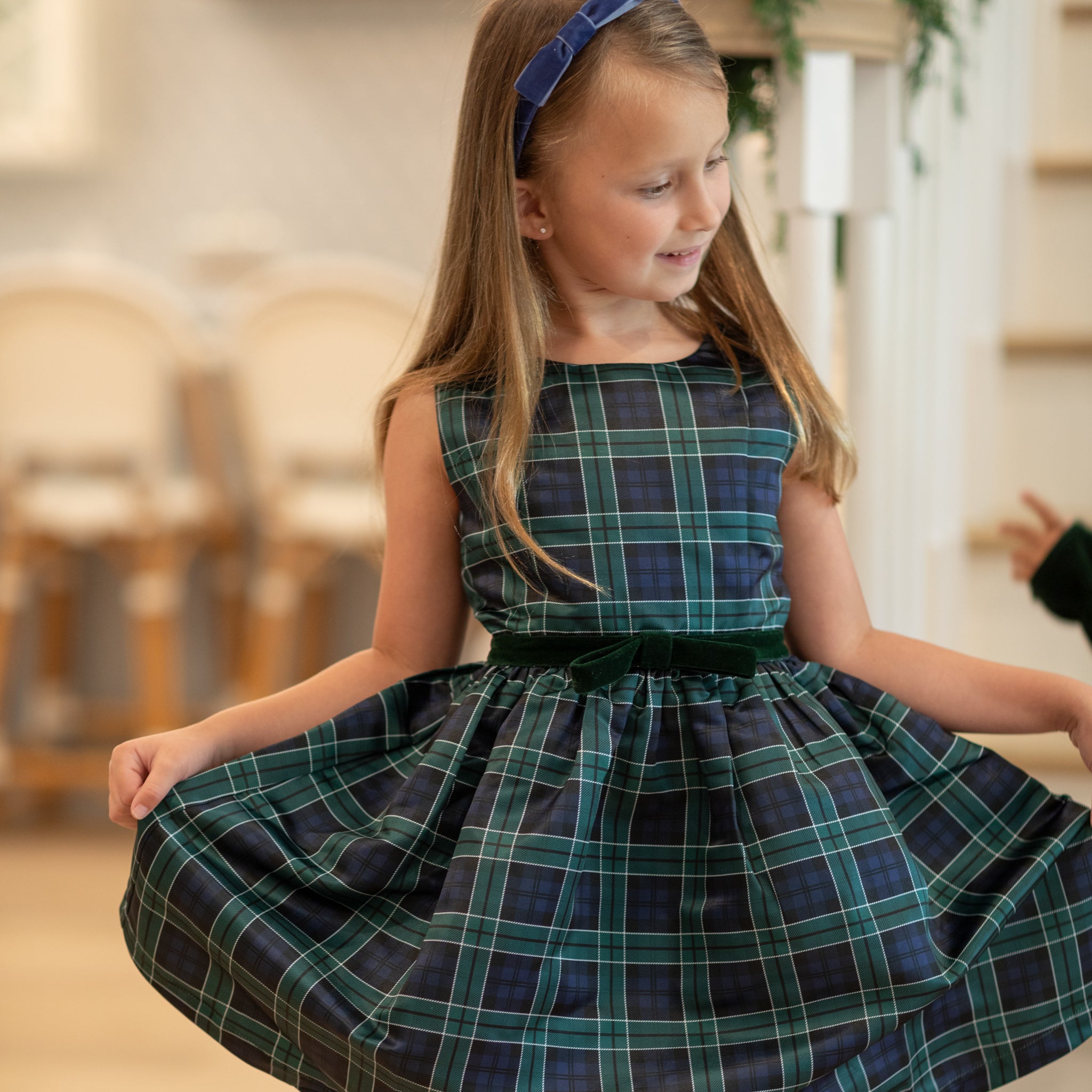 Teen girl holiday dress in Newbury Tartan with green velvet trim, classic A-line silhouette, perfect for family photos and festive gatherings