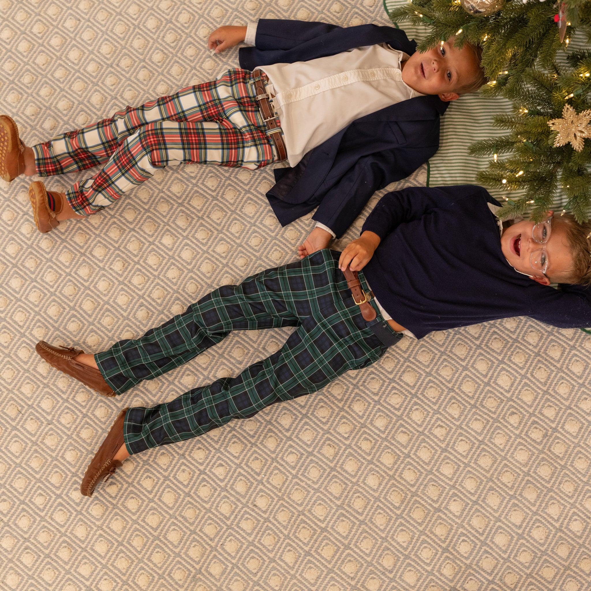 Boys holiday trousers in classic green and navy tartan, tailored Christmas pants for older boys with coordinating sibling outfits from Henry Duvall