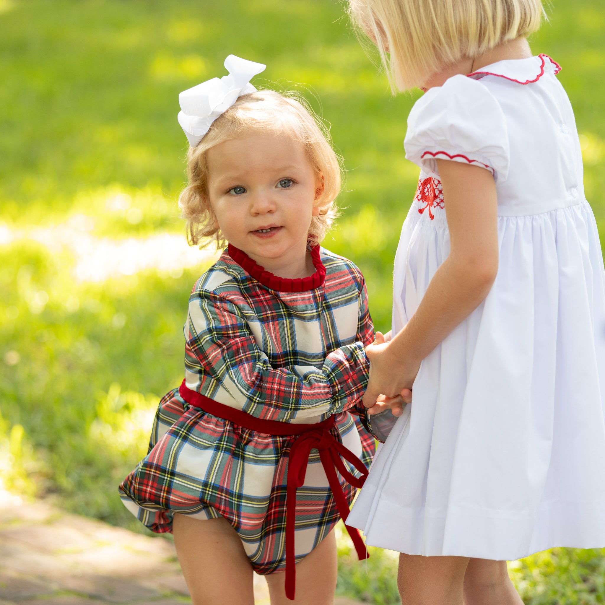 Baby girl holiday bubble in Townsend Tartan with bow waist detail, classic plaid design for fall and holiday photos – Henry Duvall timeless baby outfit
