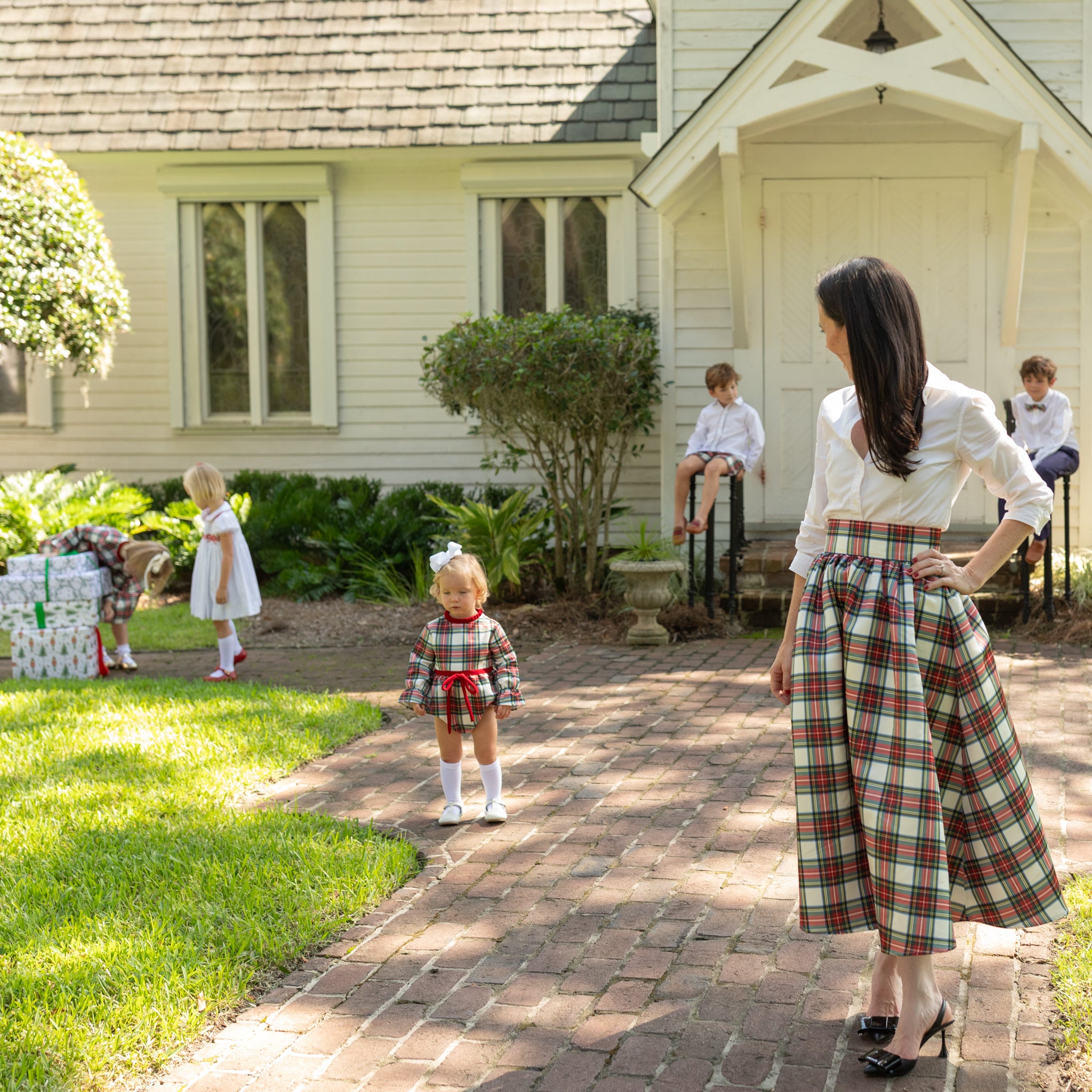 Henry Duvall Audrey Skirt for women in traditional red Townsend Tartan, classic holiday plaid skirt with flattering pleats and timeless silhouette, perfect for festive gatherings and family photos