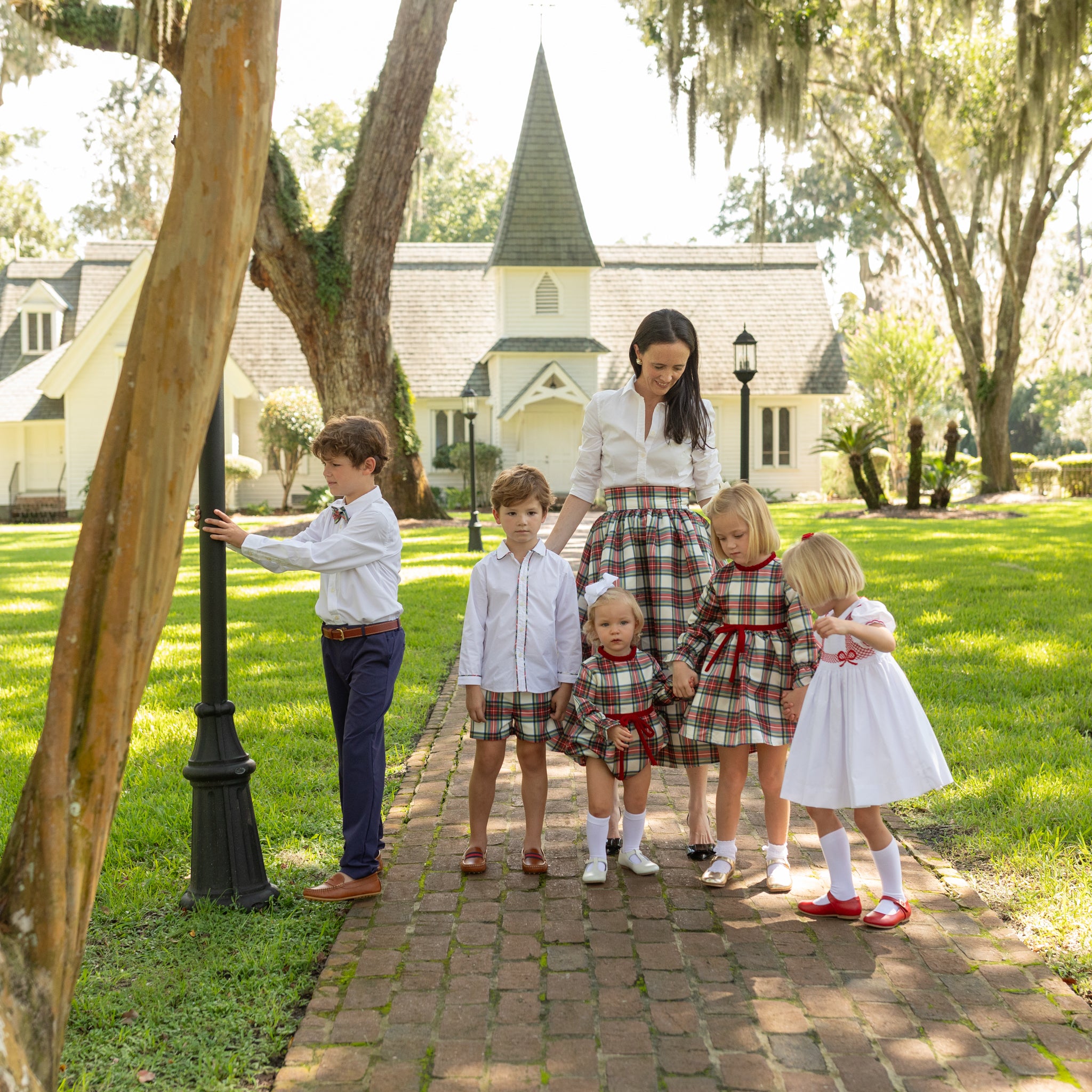 Henry Duvall Audrey Skirt for women in traditional red Townsend Tartan, classic holiday plaid skirt with flattering pleats and timeless silhouette, perfect for festive gatherings and family photos