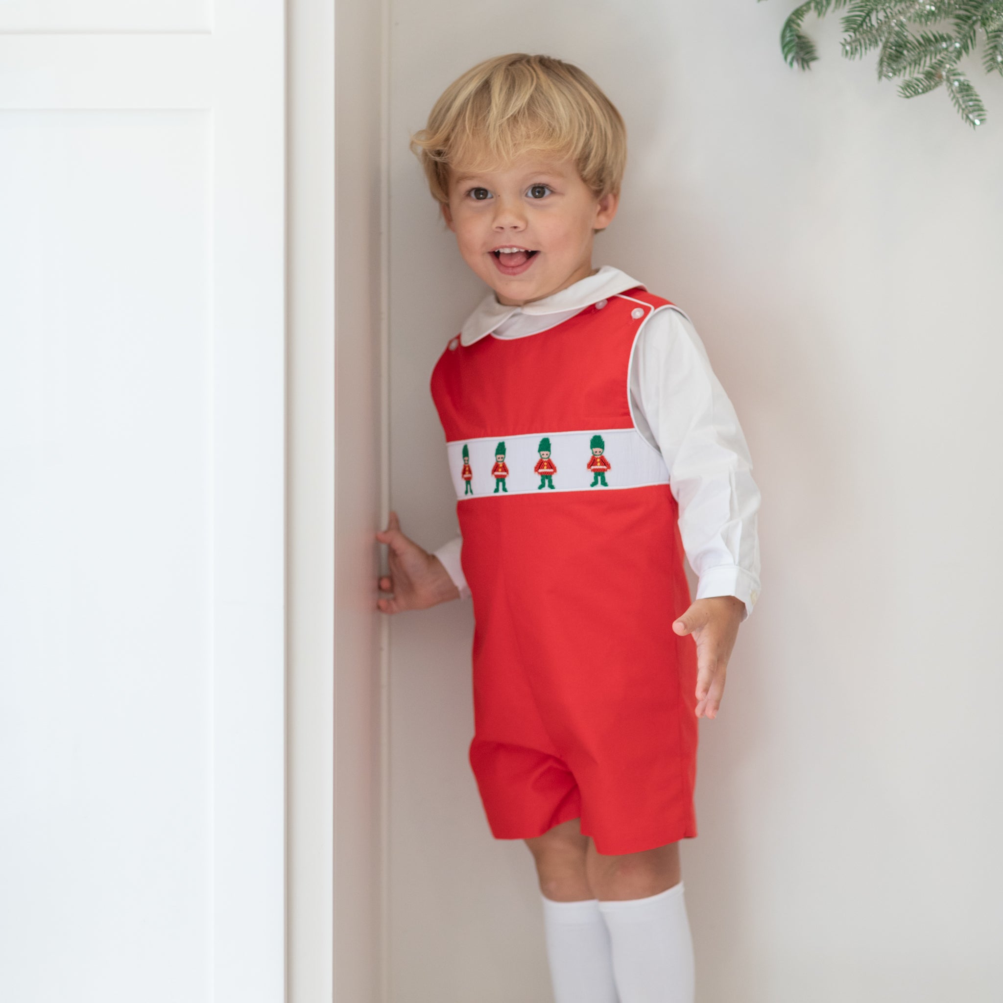 Red boys holiday Jon Jon with toy soldier smocking across the chest, Henry Duvall George Jon Jon in cotton poplin for classic Christmas dressing