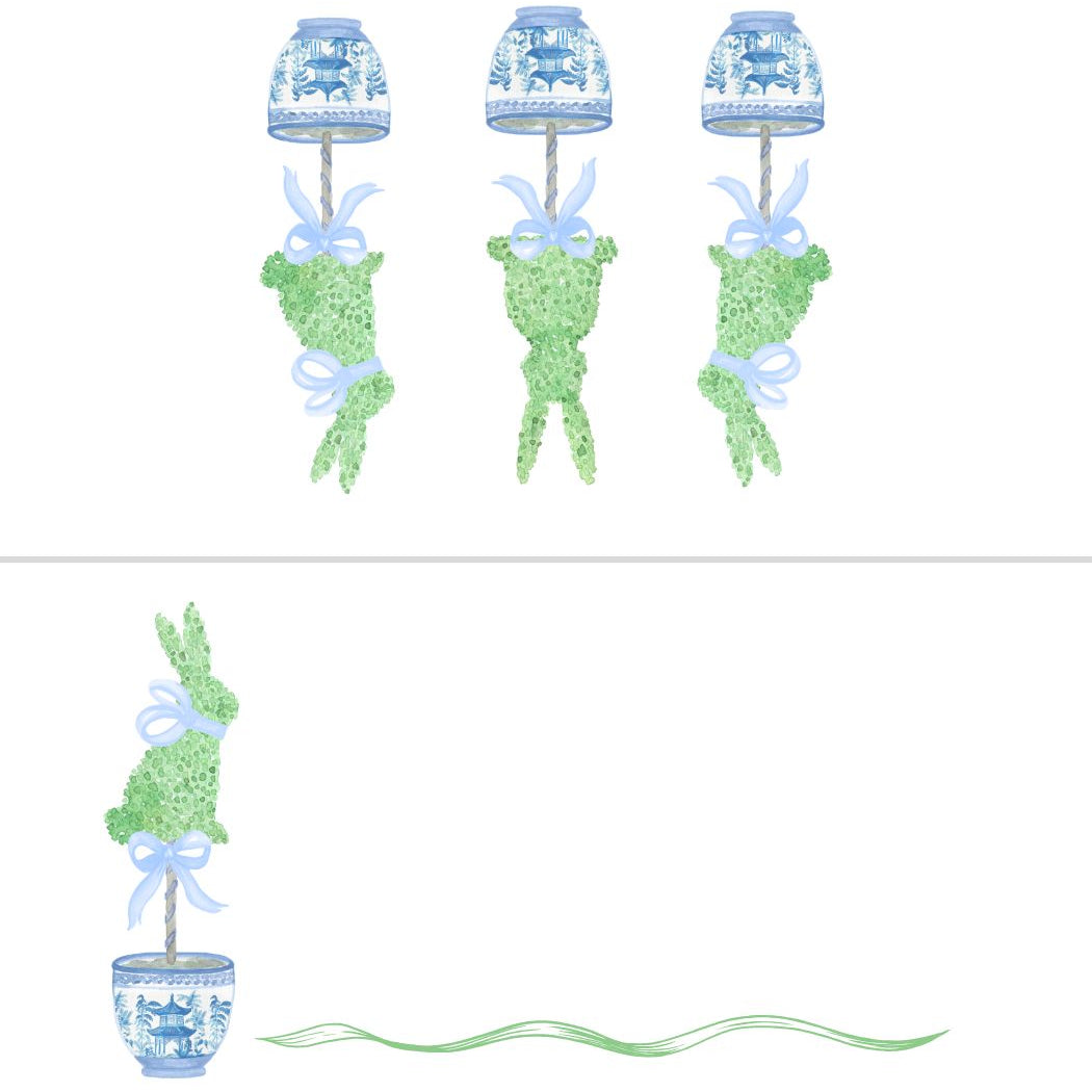 Decorative set with topiary trees, lanterns, and ribbons on a white background