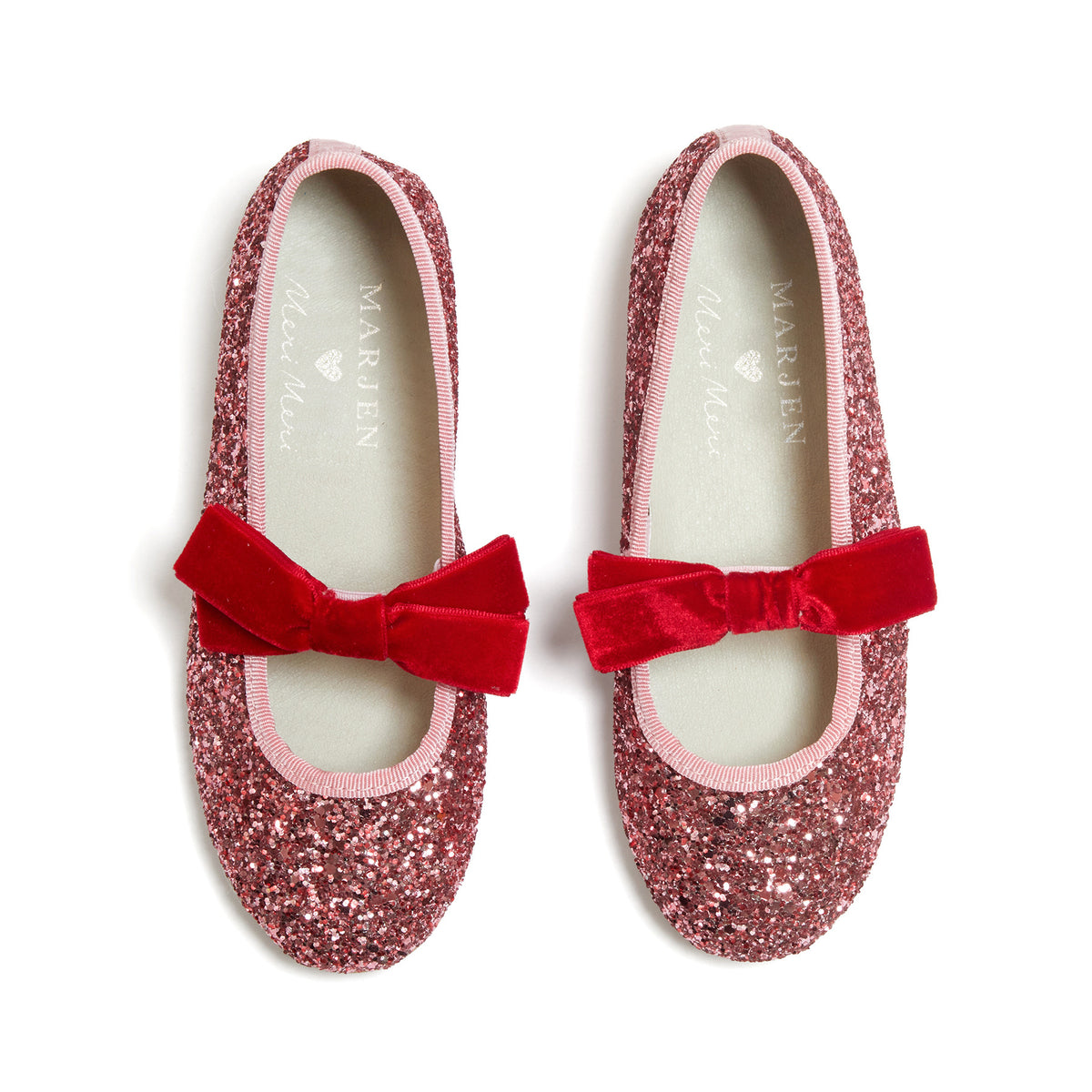 Meri Meri x Marjen Sabrina pink glitter Mary Jane with red velvet bow, top-down view of pair