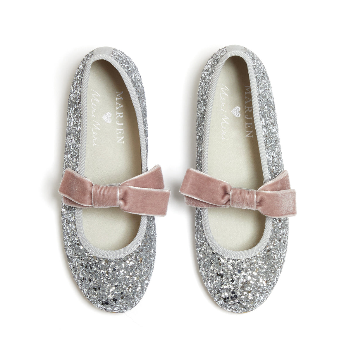 Meri Meri x Marjen Sabrina silver glitter Mary Jane with rose velvet bow, top-down view of pair