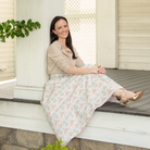 Henry Duvall Audrey Skirt for women in Fall Floral, featuring a full pleated midi silhouette in a multicolor autumn floral print.