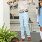 Henry Duvall Bradford Trousers in Bay Tree Blue light blue corduroy for boys, fully lined in King’s Way Khaki Check with contrast checked cuffs that can be rolled up or worn down.
