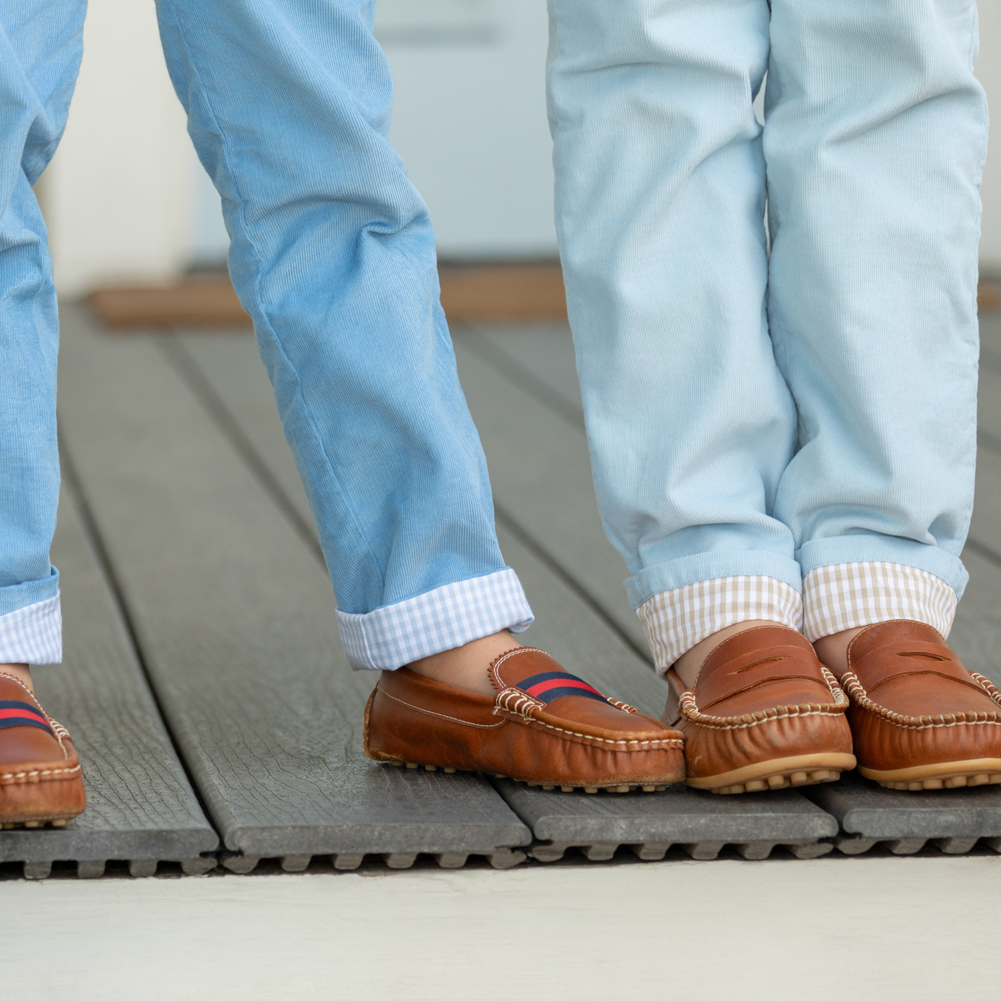 Henry Duvall Bradford Trousers in Bay Tree Blue light blue corduroy for boys, fully lined in King’s Way Khaki Check with contrast checked cuffs that can be rolled up or worn down.