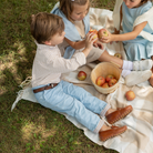 Henry Duvall Bradford Trousers in Bay Tree Blue light blue corduroy for boys, fully lined in King’s Way Khaki Check with contrast checked cuffs that can be rolled up or worn down.